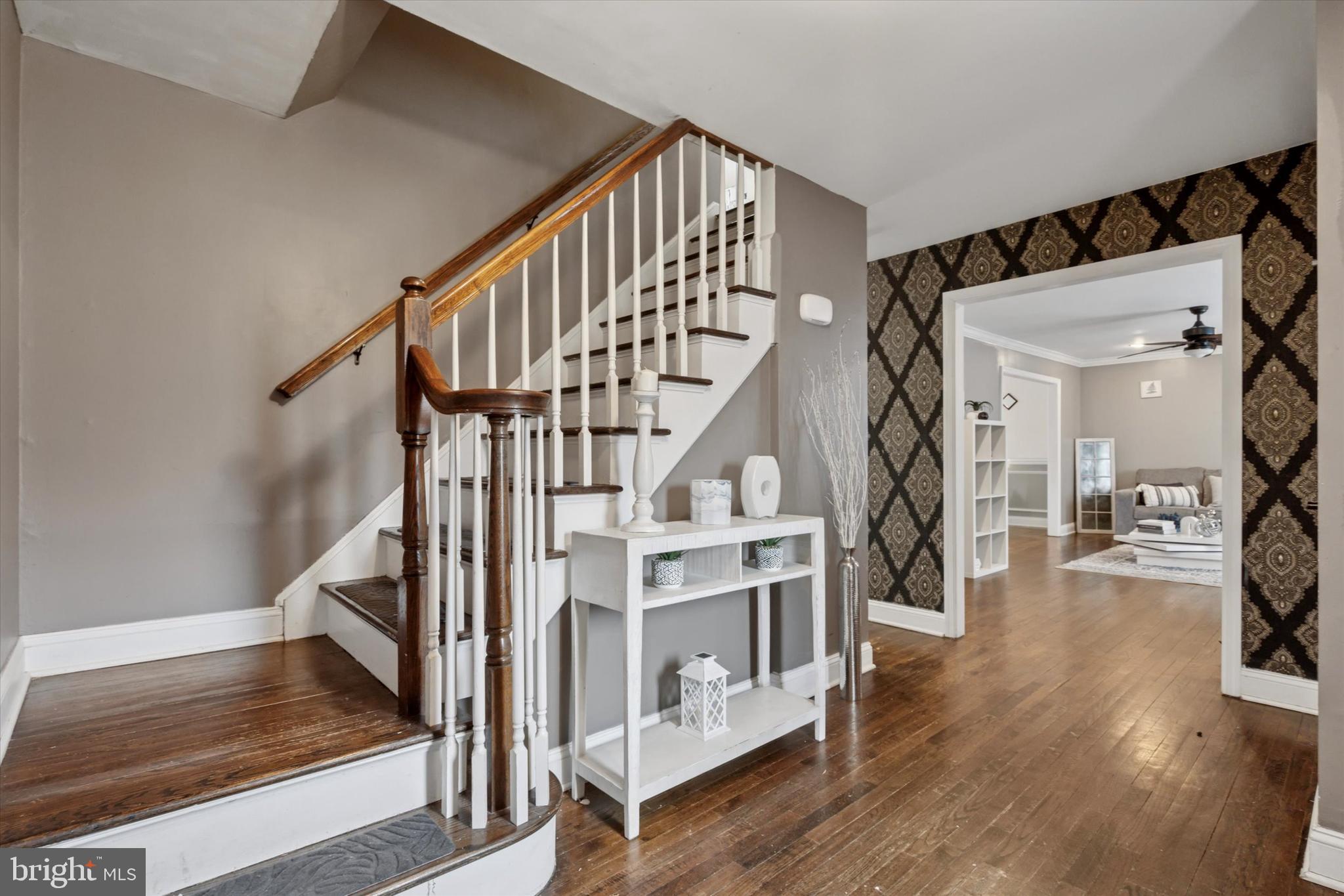 2310 Klockner Road Hamilton, NJ 08690 - Photo 4 of 33 a view of entryway and hall with wooden floor