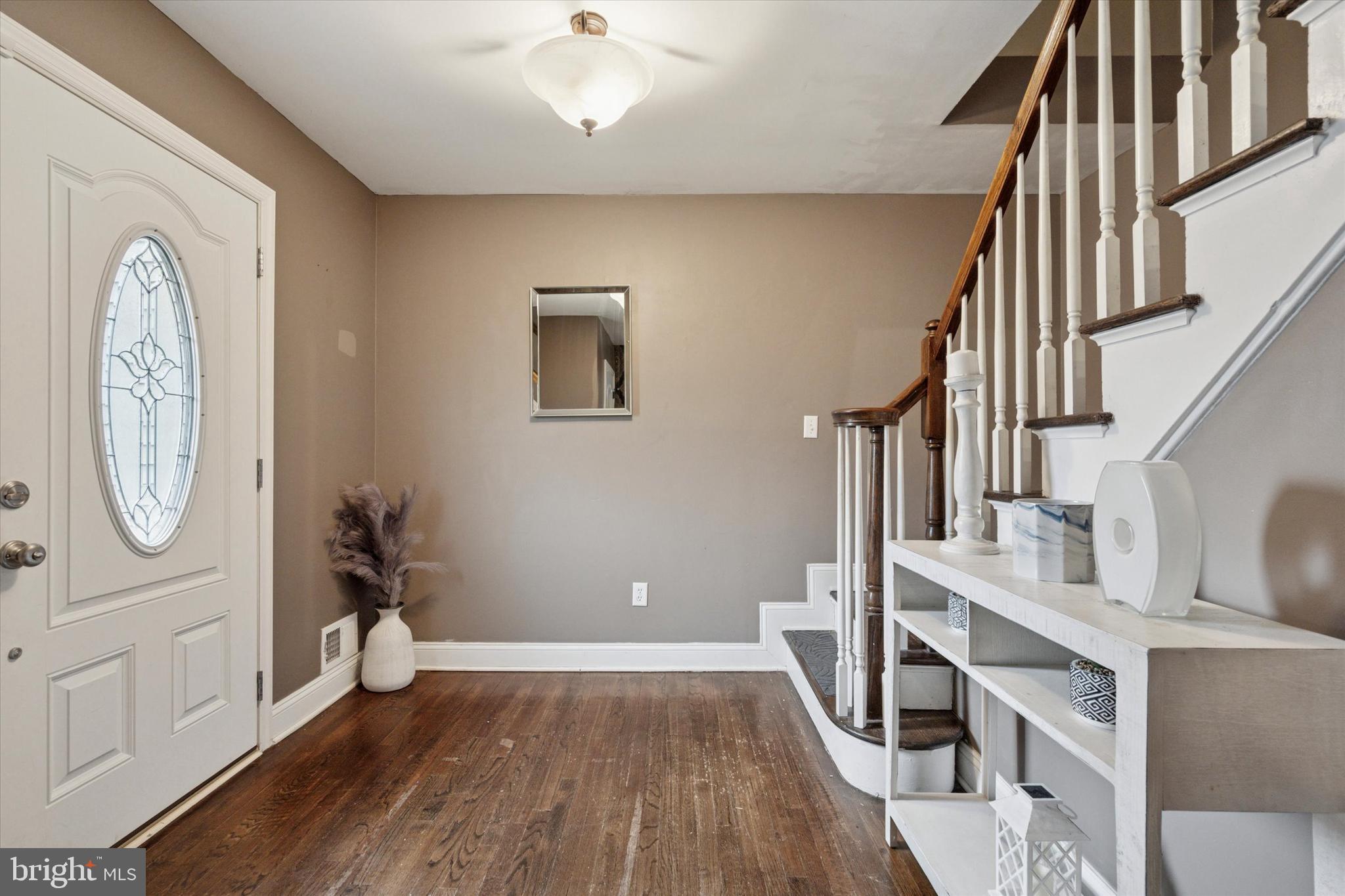 2310 Klockner Road Hamilton, NJ 08690 - Photo 5 of 33 a view of livingroom with furniture and wooden floor
