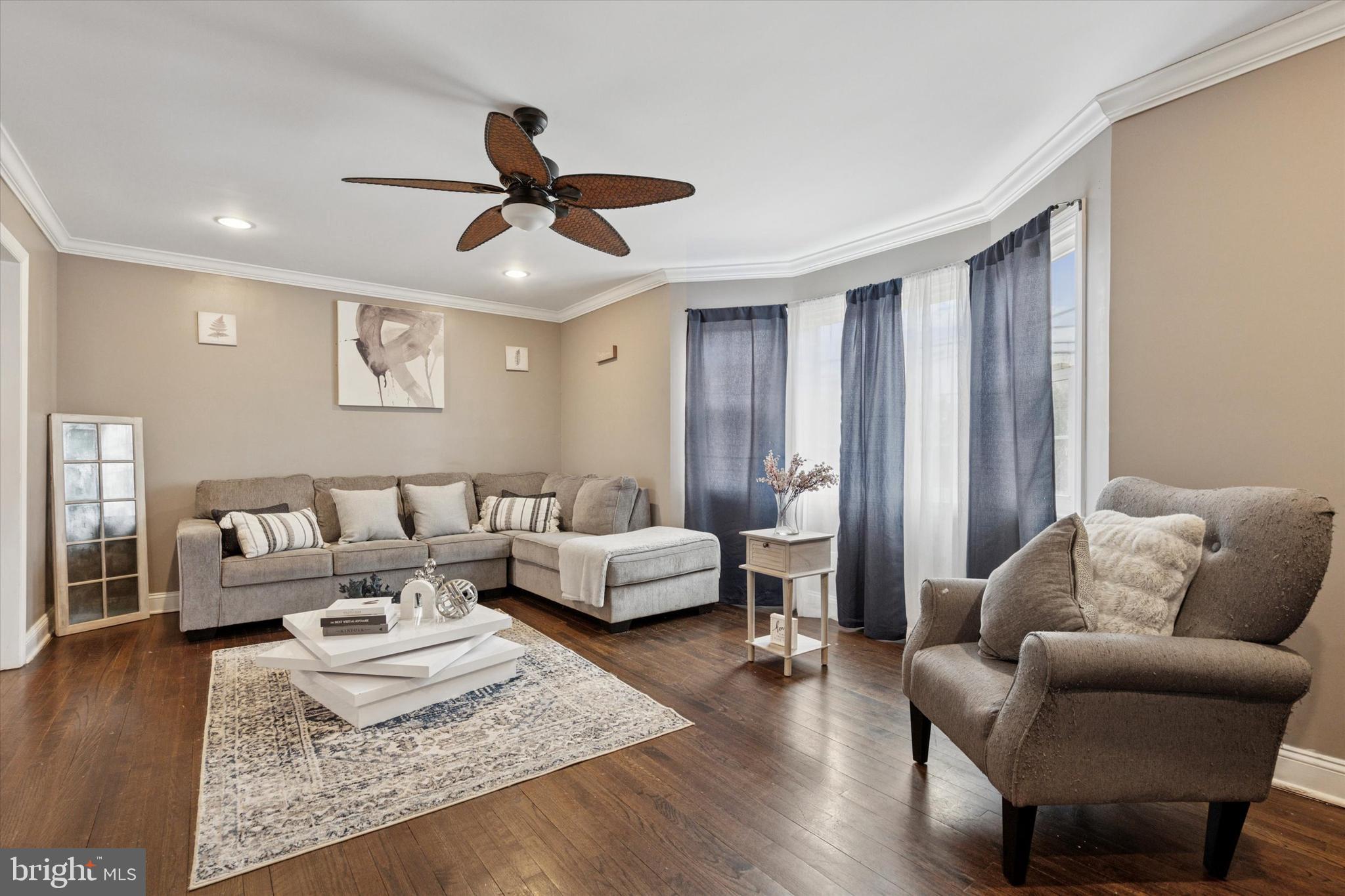 2310 Klockner Road Hamilton, NJ 08690 - Photo 6 of 33 a living room with furniture or couch and a wooden floor