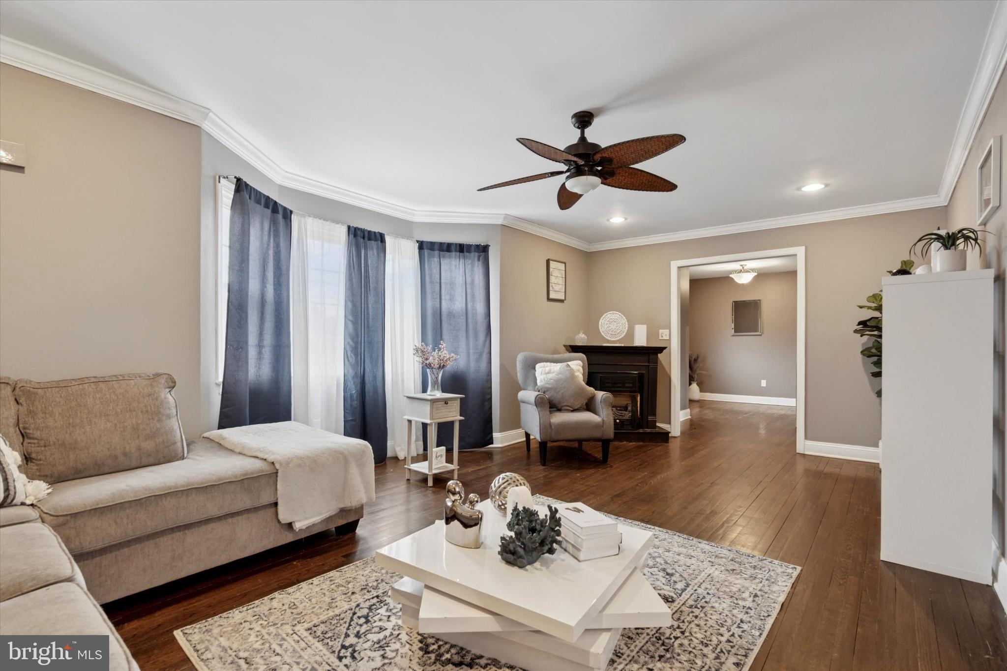 2310 Klockner Road Hamilton, NJ 08690 - Photo 8 of 33 a living room with furniture and a wooden floor
