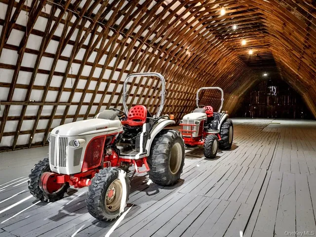 a view of a patio with table and chairs with wooden floor