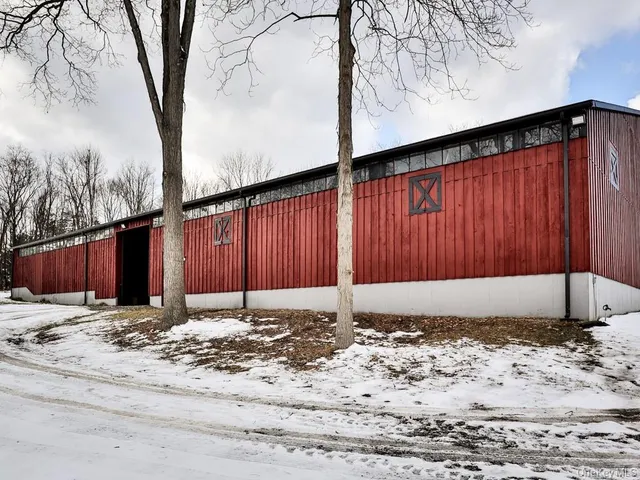 a view of a backyard of a house