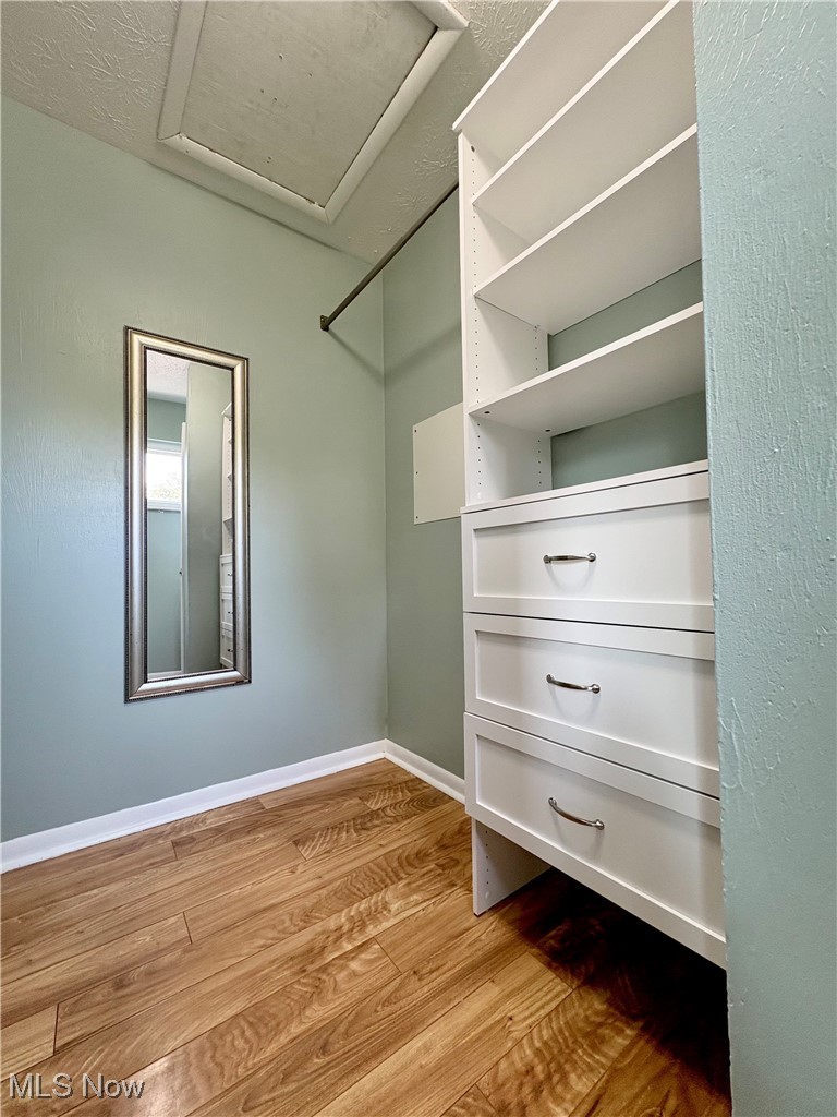 7050 Chillicothe Road, Unit C11 Mentor, OH 44060 - Photo 16 of 29 Walk in closet with wood finished floors