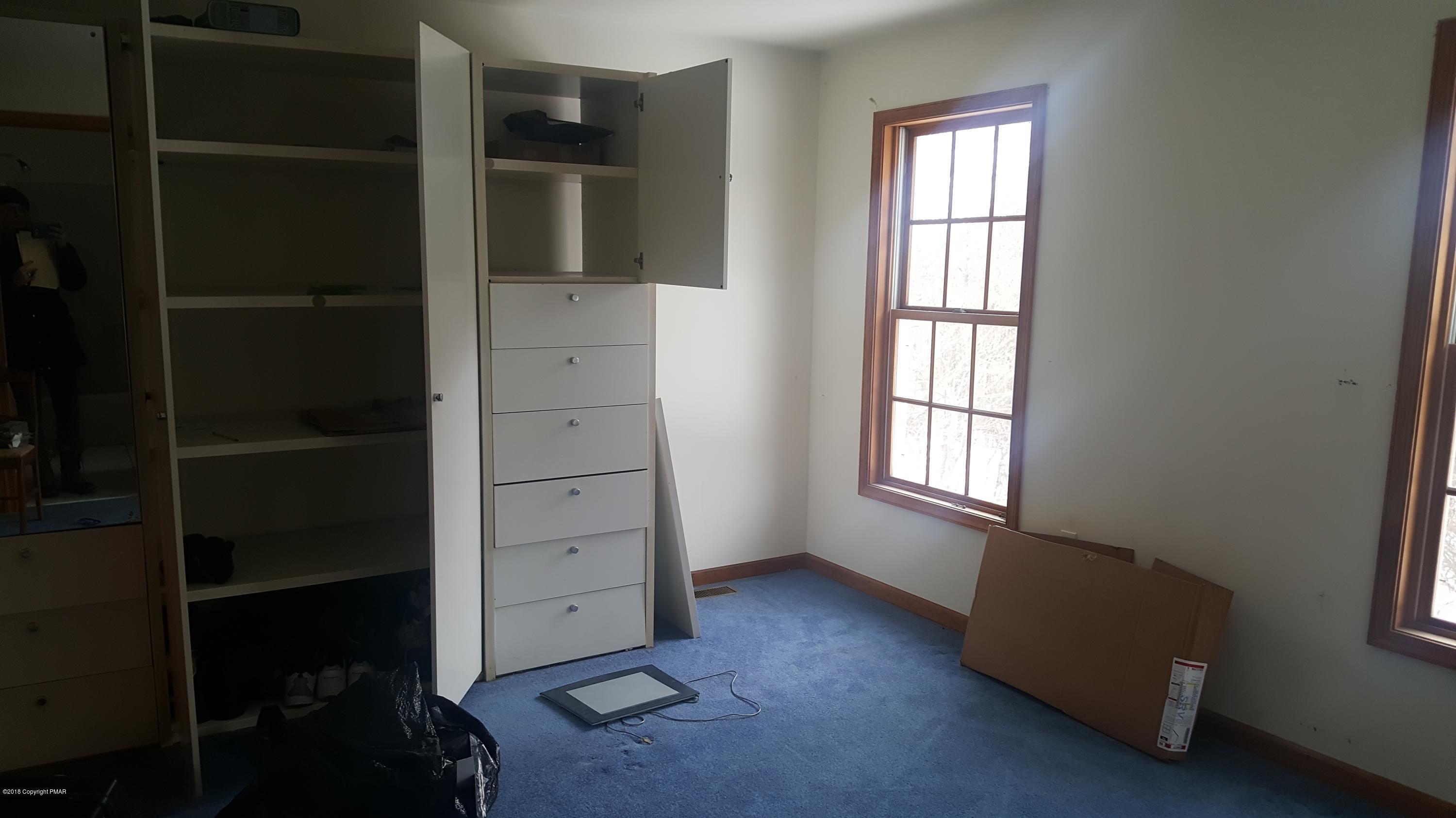 1485 Clover Road Long Pond, PA 18334 - Photo 11 of 23 an empty room with windows and closet
