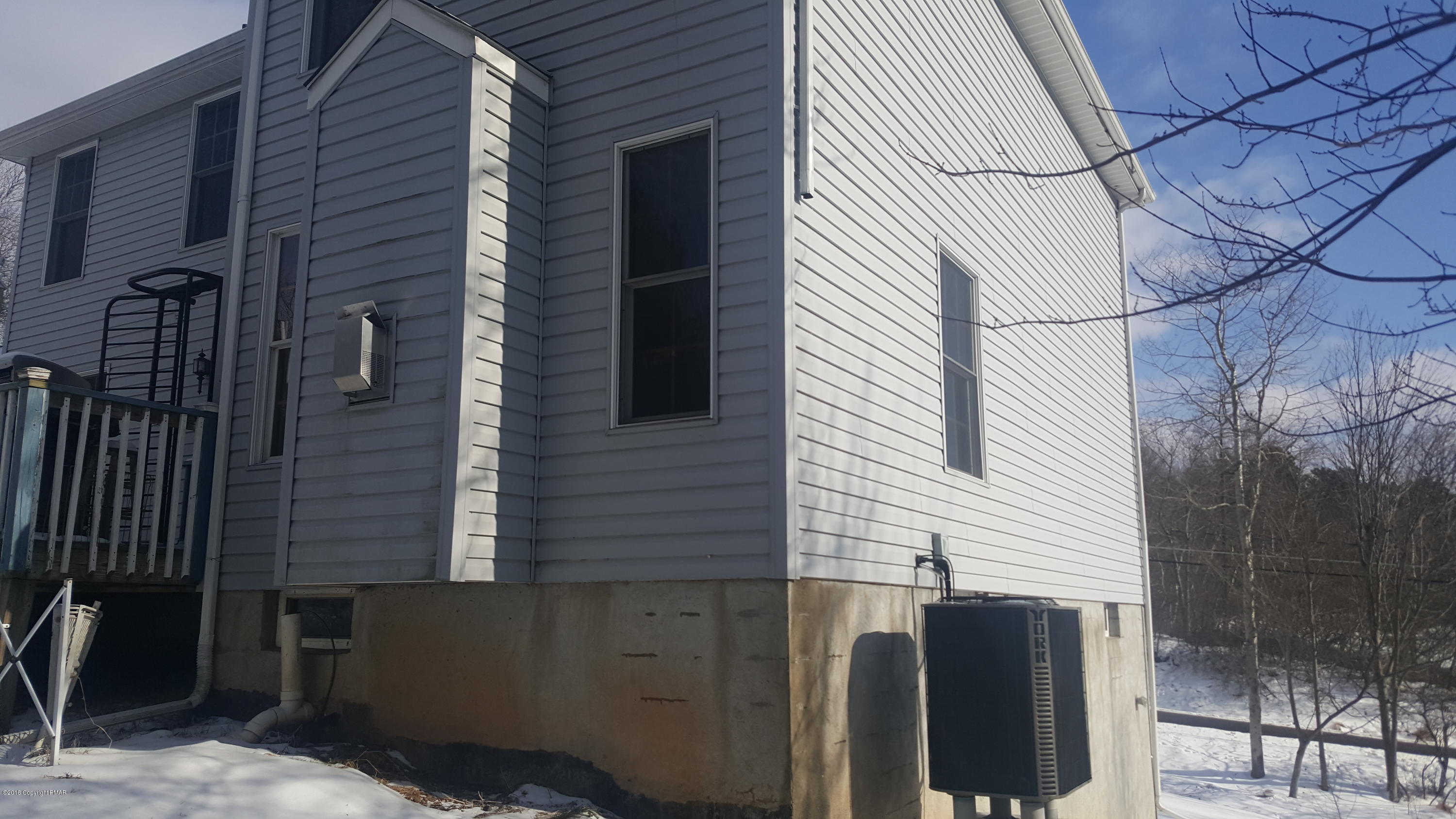 1485 Clover Road Long Pond, PA 18334 - Photo 20 of 23 a view of a house with a door