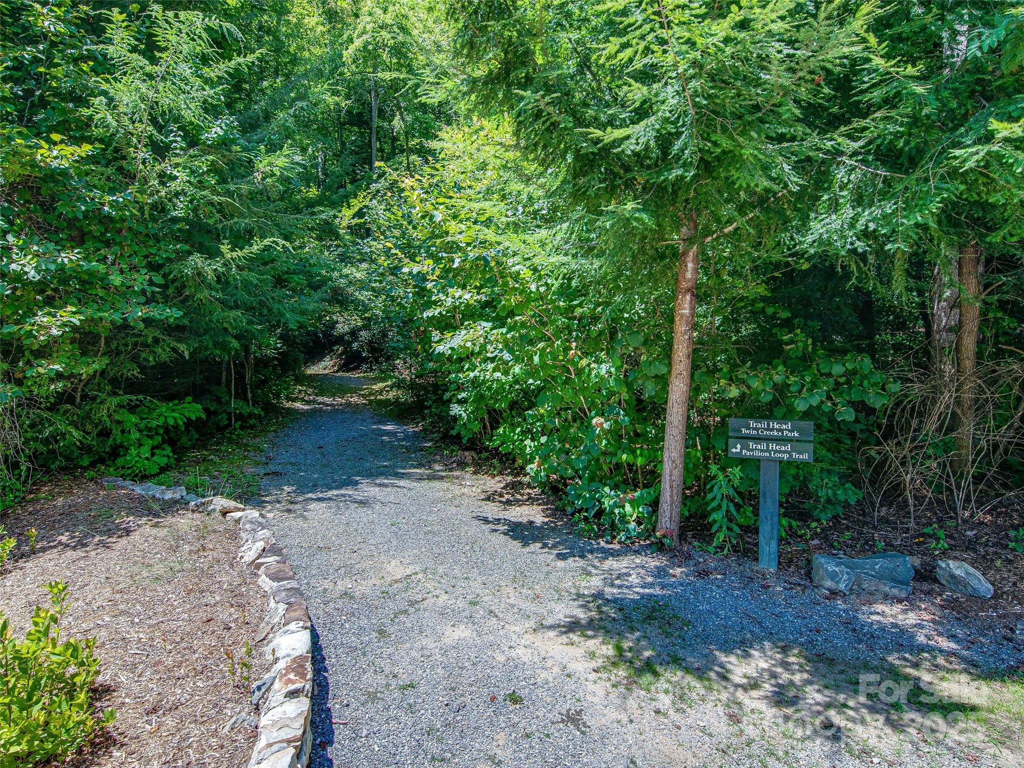 36 Slide Rock Way Fairview, NC 28730 - Photo 21 of 24 a view of a park with large trees