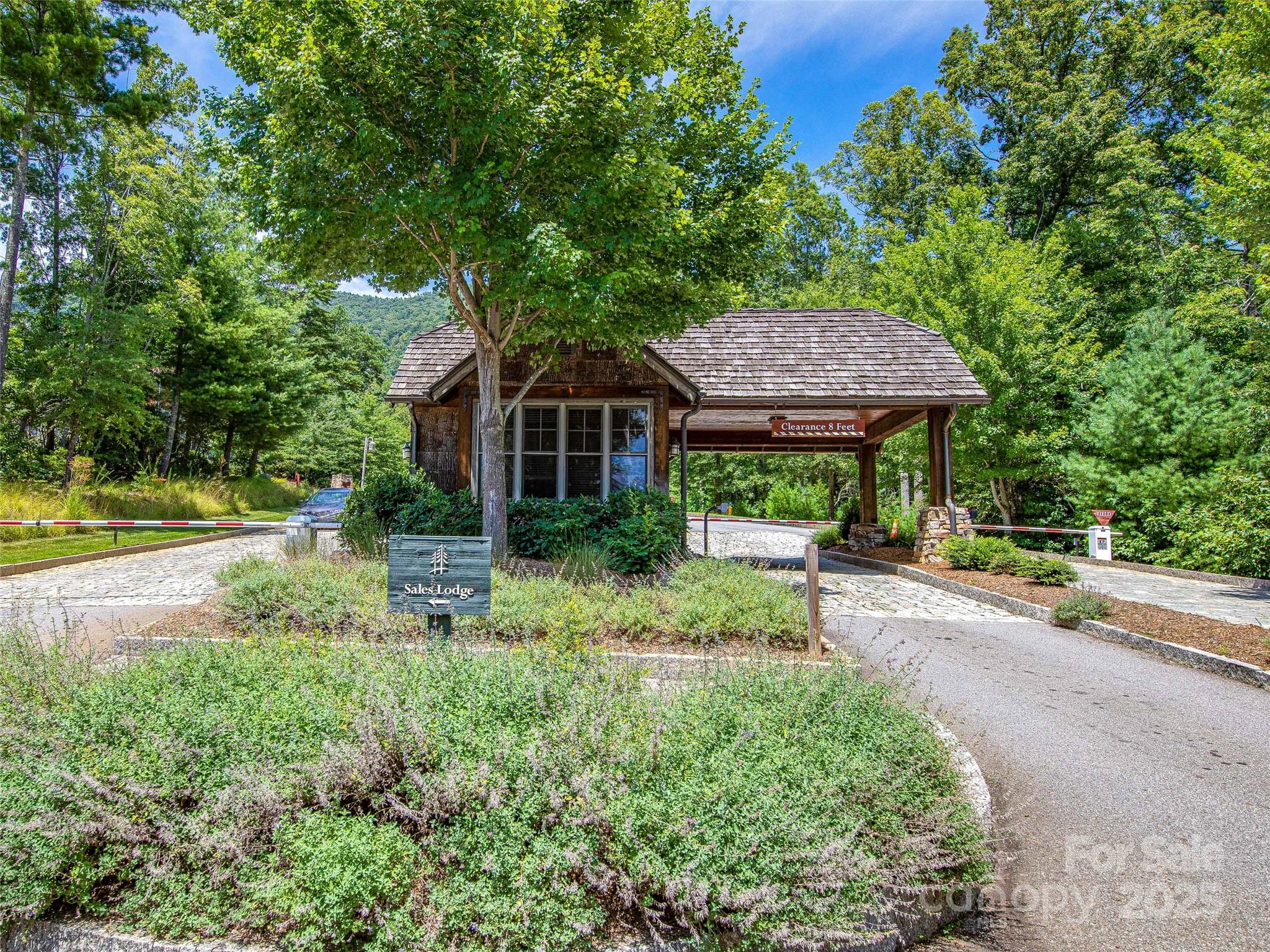 36 Slide Rock Way Fairview, NC 28730 - Photo 24 of 24 a view of a house with yard and plants