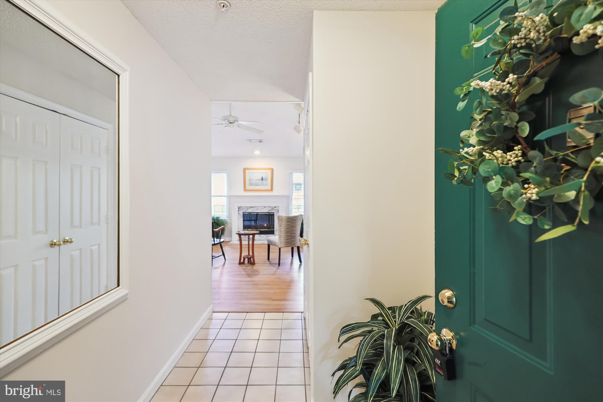 12005 Taliesin Place, Unit 35 Reston, VA 20190 - Photo 1 of 39 a view of entryway with flower pots