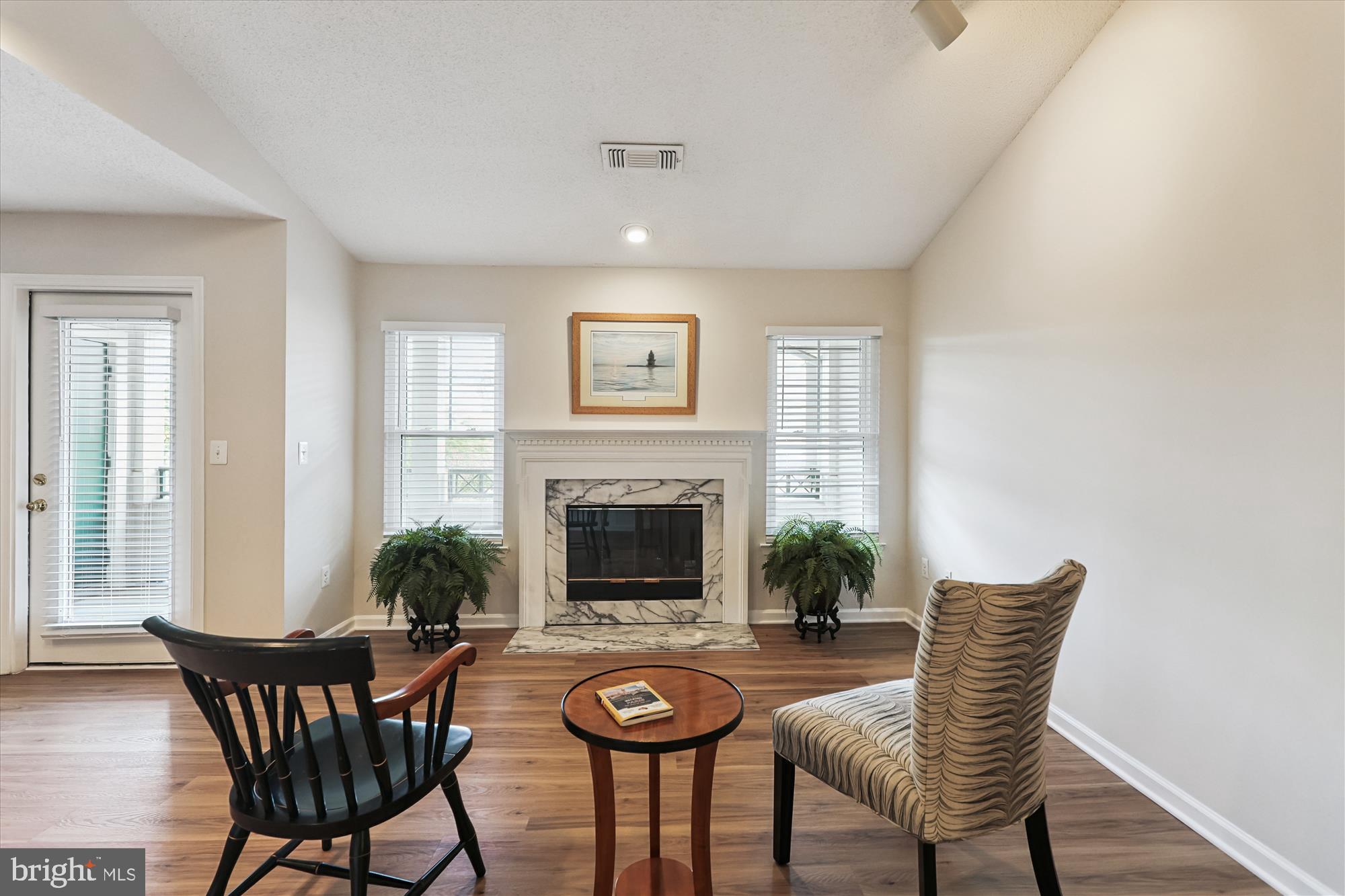 12005 Taliesin Place, Unit 35 Reston, VA 20190 - Photo 2 of 39 a view of a livingroom with furniture and fireplace