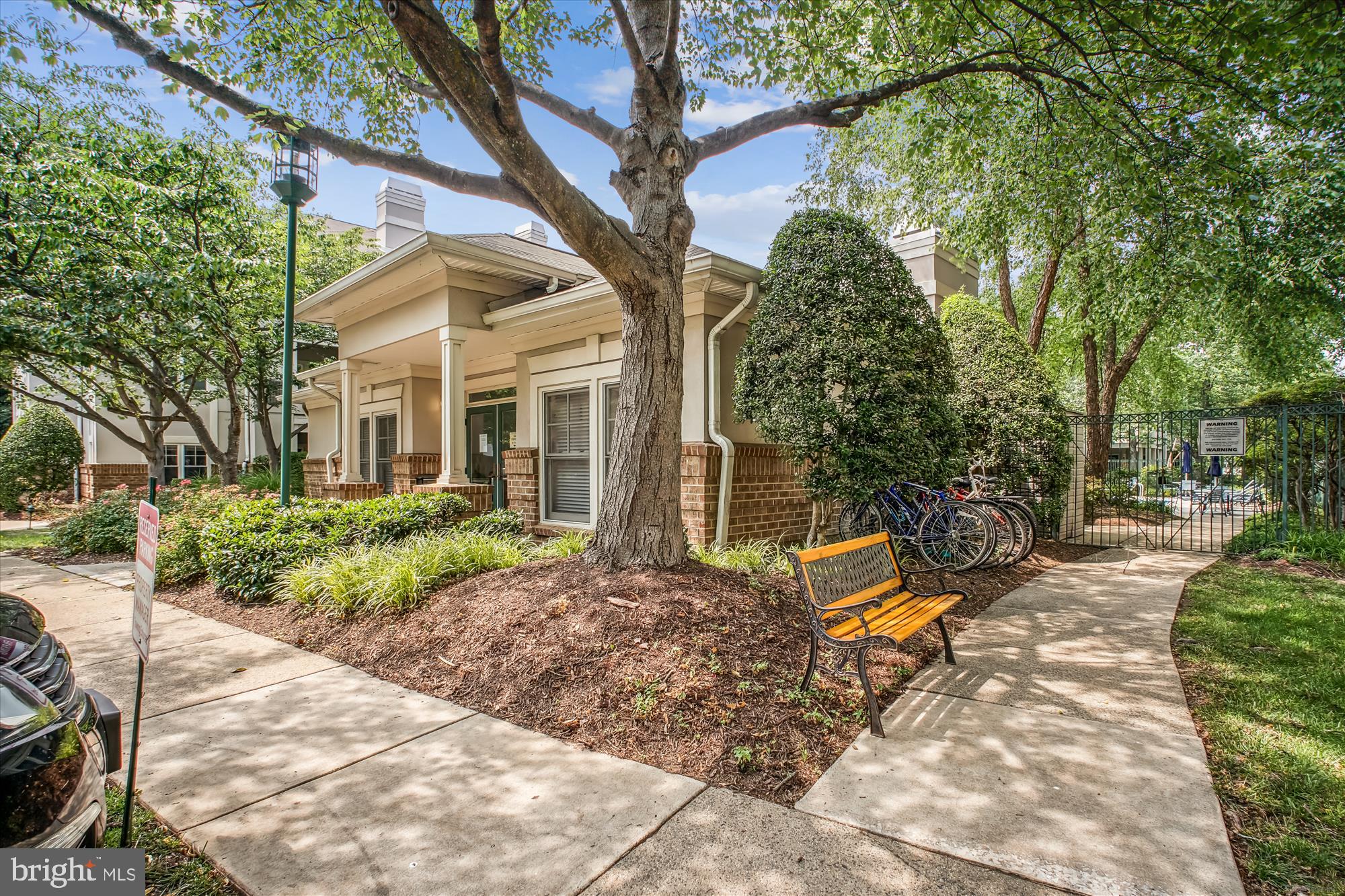 12005 Taliesin Place, Unit 35 Reston, VA 20190 - Photo 24 of 39 a view of a house with backyard and sitting area