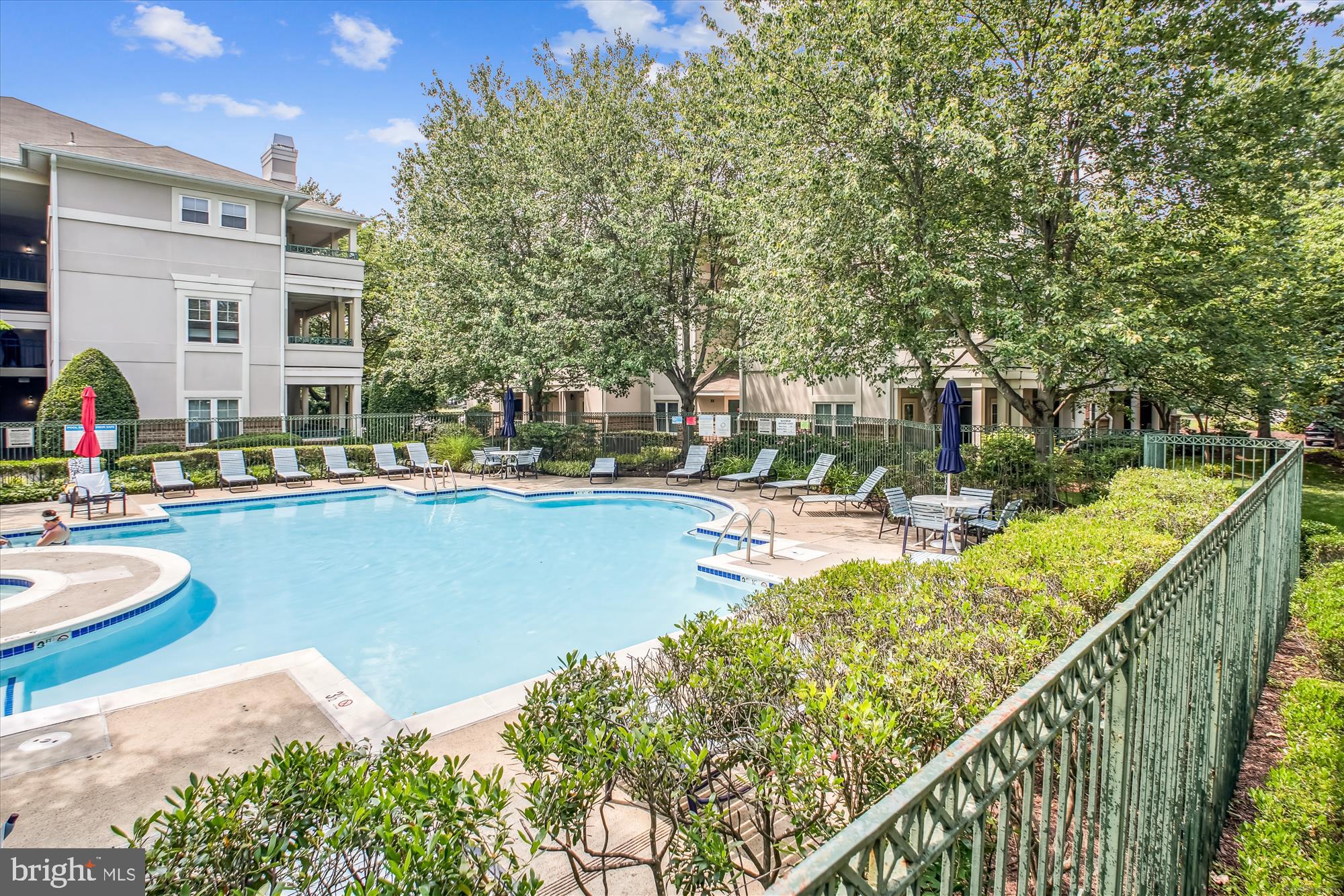 12005 Taliesin Place, Unit 35 Reston, VA 20190 - Photo 28 of 39 a view of swimming pool with chairs