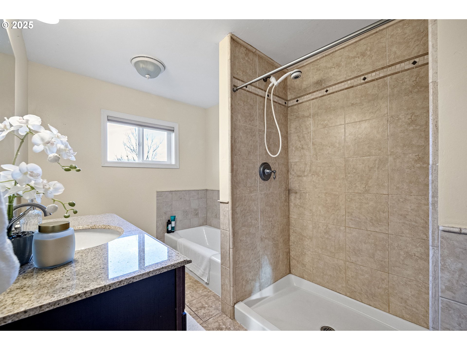 84020 Brown Road Dexter, OR 97431 - Photo 18 of 48 a bathroom with a granite countertop shower sink vanity and mirror