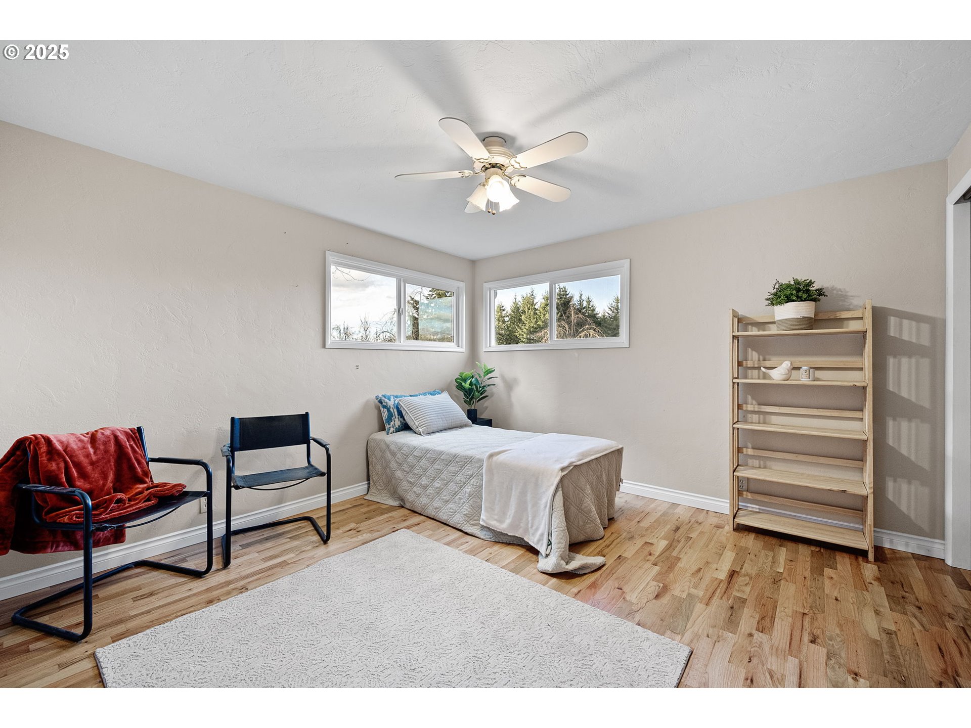 84020 Brown Road Dexter, OR 97431 - Photo 19 of 48 a living room with furniture and a wooden floor