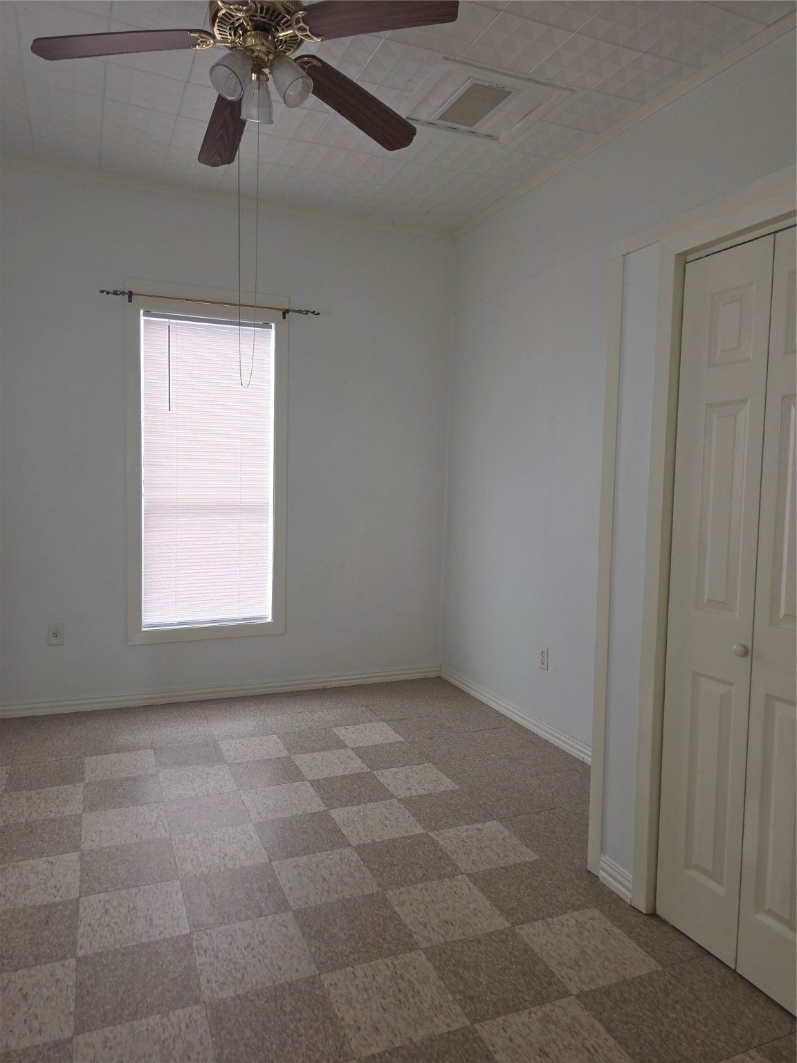 601 East Washington Avenue, Unit A Navasota, TX 77868 - Photo 12 of 17 a view of an empty room with a window