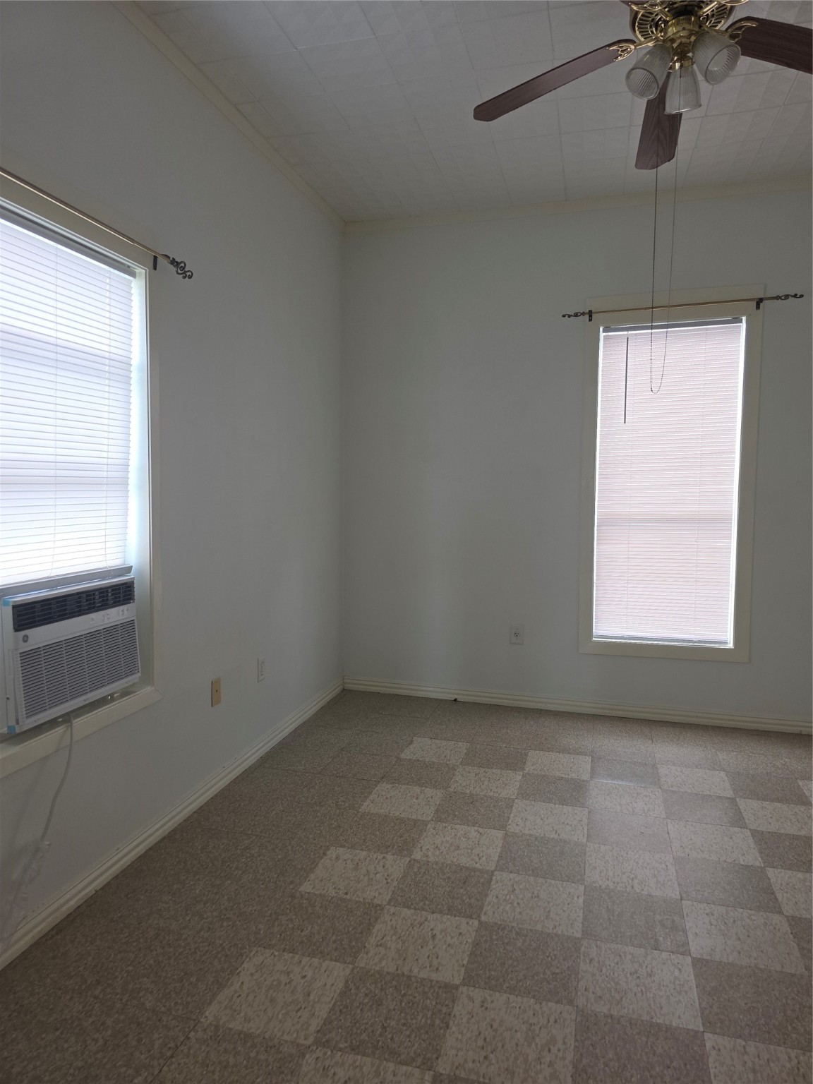 601 East Washington Avenue, Unit A Navasota, TX 77868 - Photo 14 of 17 a view of an empty room with a window