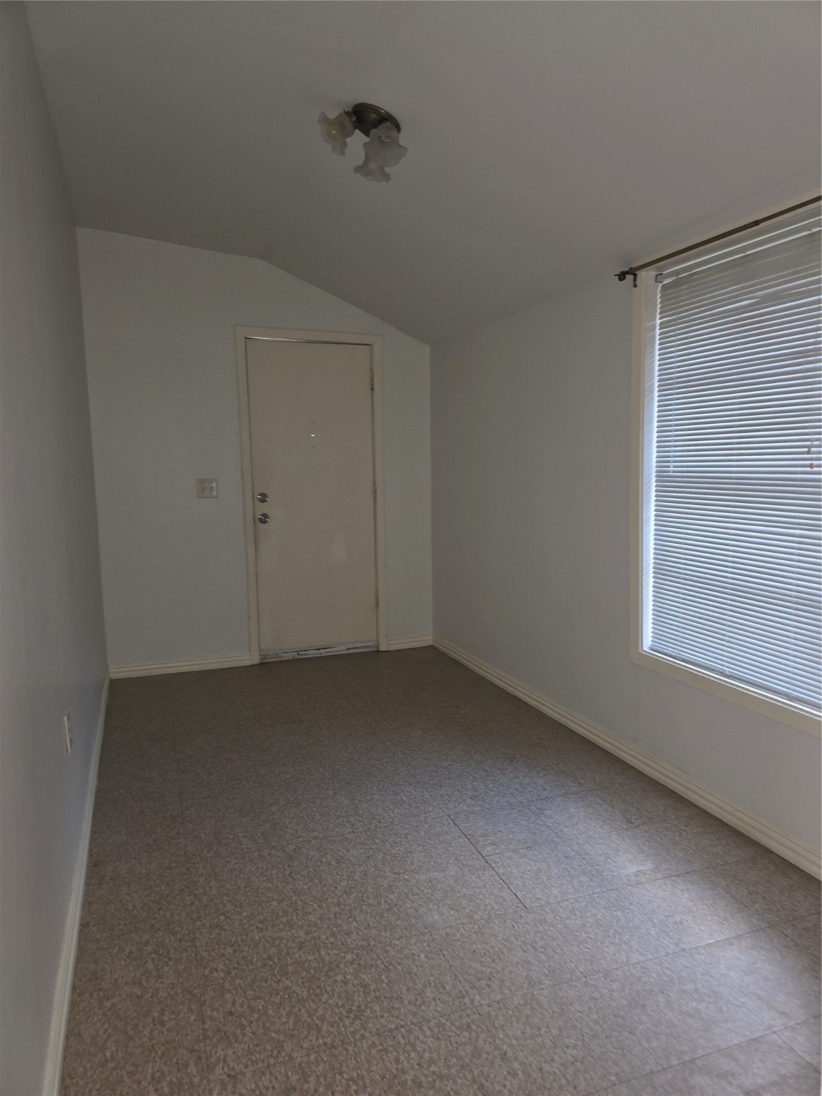 601 East Washington Avenue, Unit A Navasota, TX 77868 - Photo 16 of 17 a view of room and window