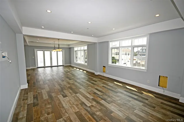 a view of an empty room and window