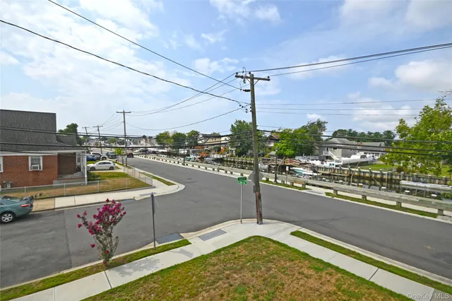 a view of a balcony with wooden floor