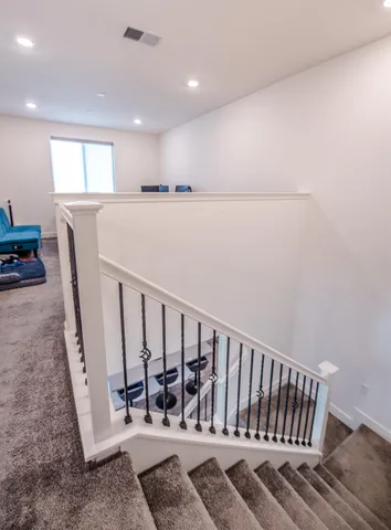 a bedroom with a bed and a closet