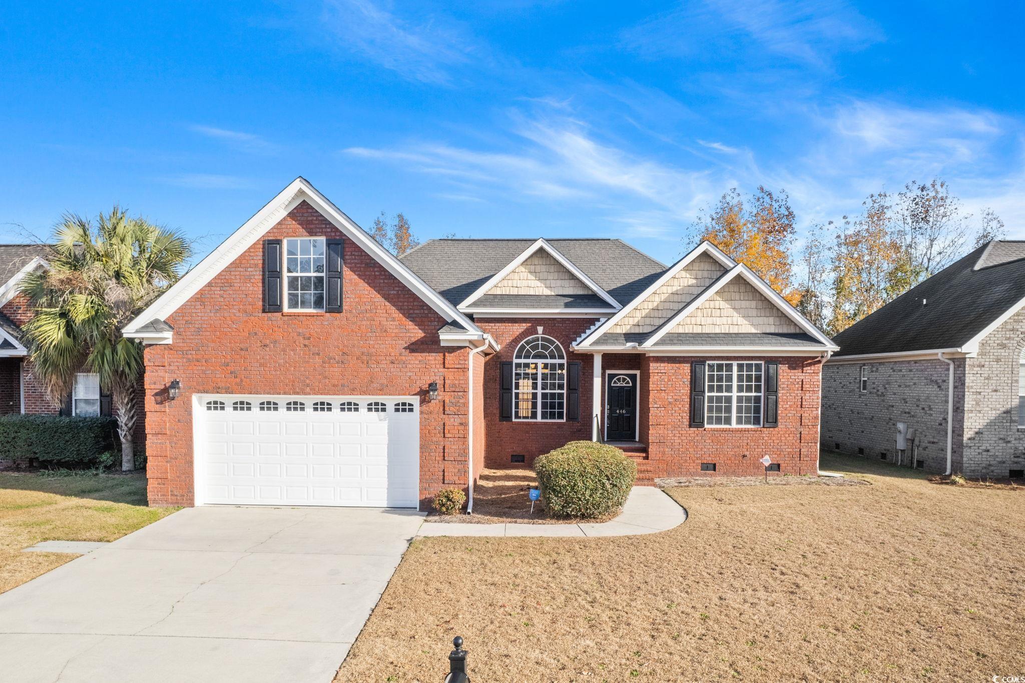 446 Sterling Drive Florence, SC 29501 - Photo 1 of 40 View of front facade featuring a garage