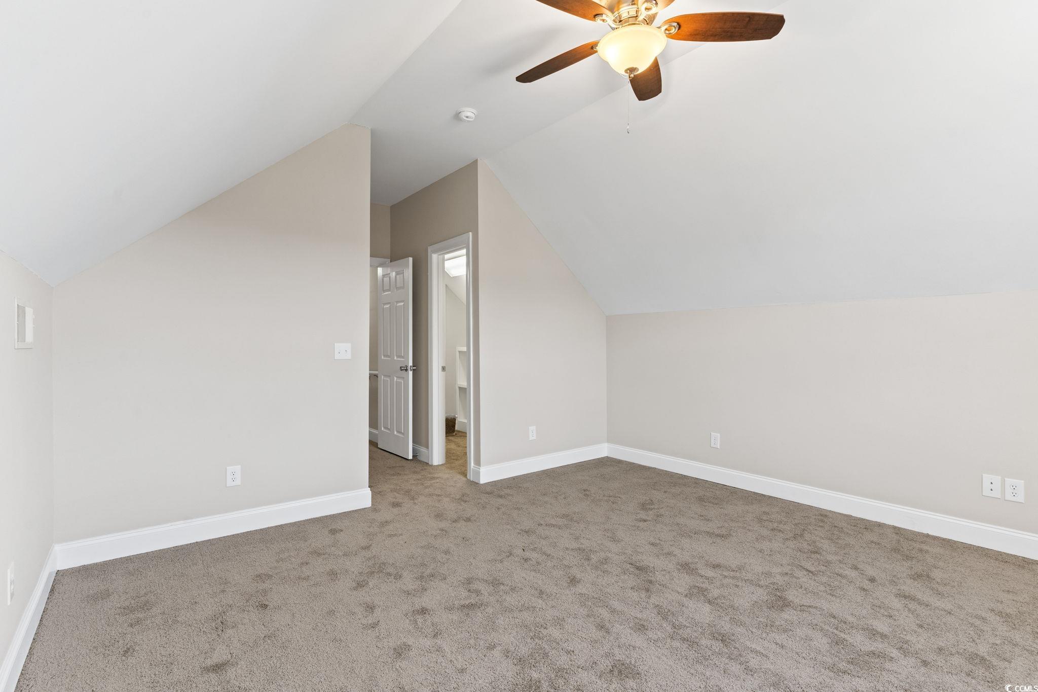 446 Sterling Drive Florence, SC 29501 - Photo 11 of 40 Bonus room with ceiling fan, lofted ceiling, and c