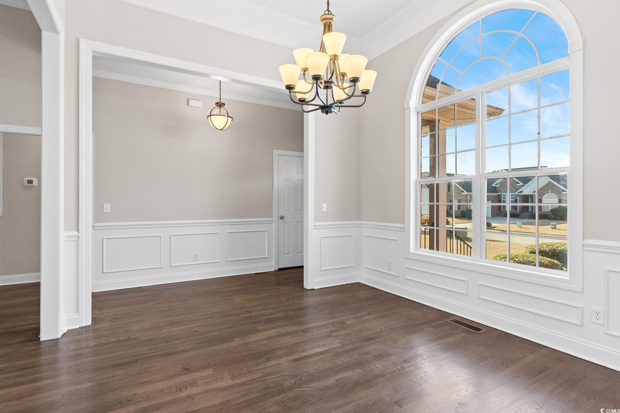 446 Sterling Drive Florence, SC 29501 - Photo 19 of 40 Unfurnished dining area featuring dark hardwood /