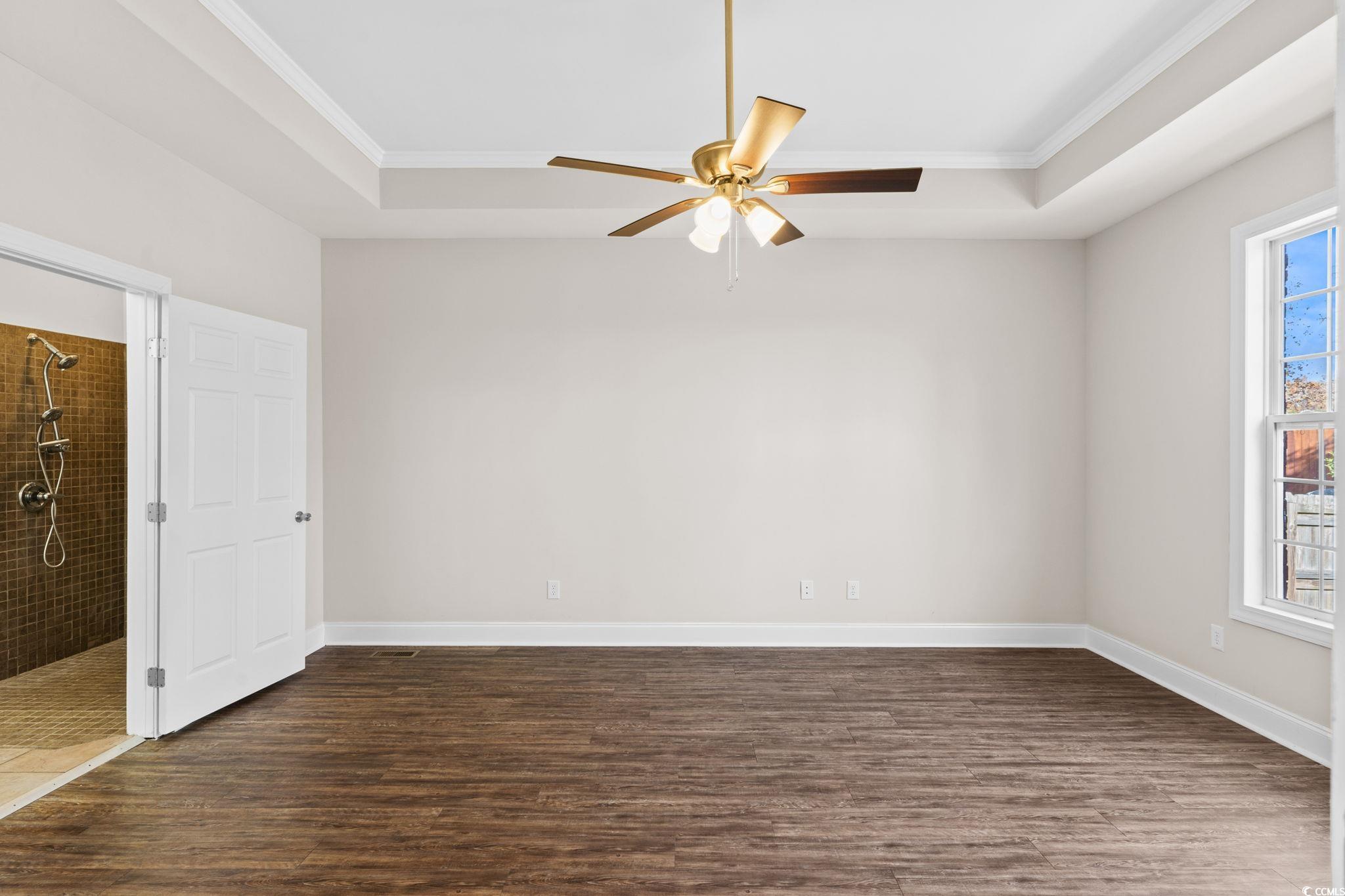 446 Sterling Drive Florence, SC 29501 - Photo 21 of 40 Unfurnished room featuring a tray ceiling, crown m