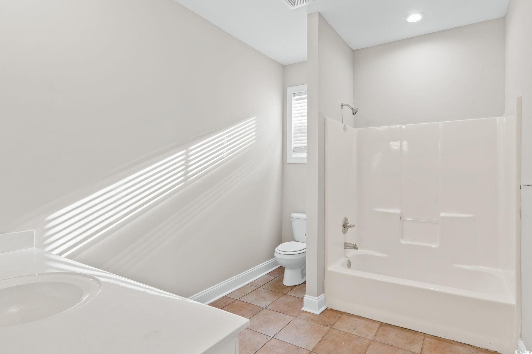 446 Sterling Drive Florence, SC 29501 - Photo 29 of 40 Full bathroom featuring tile patterned flooring,