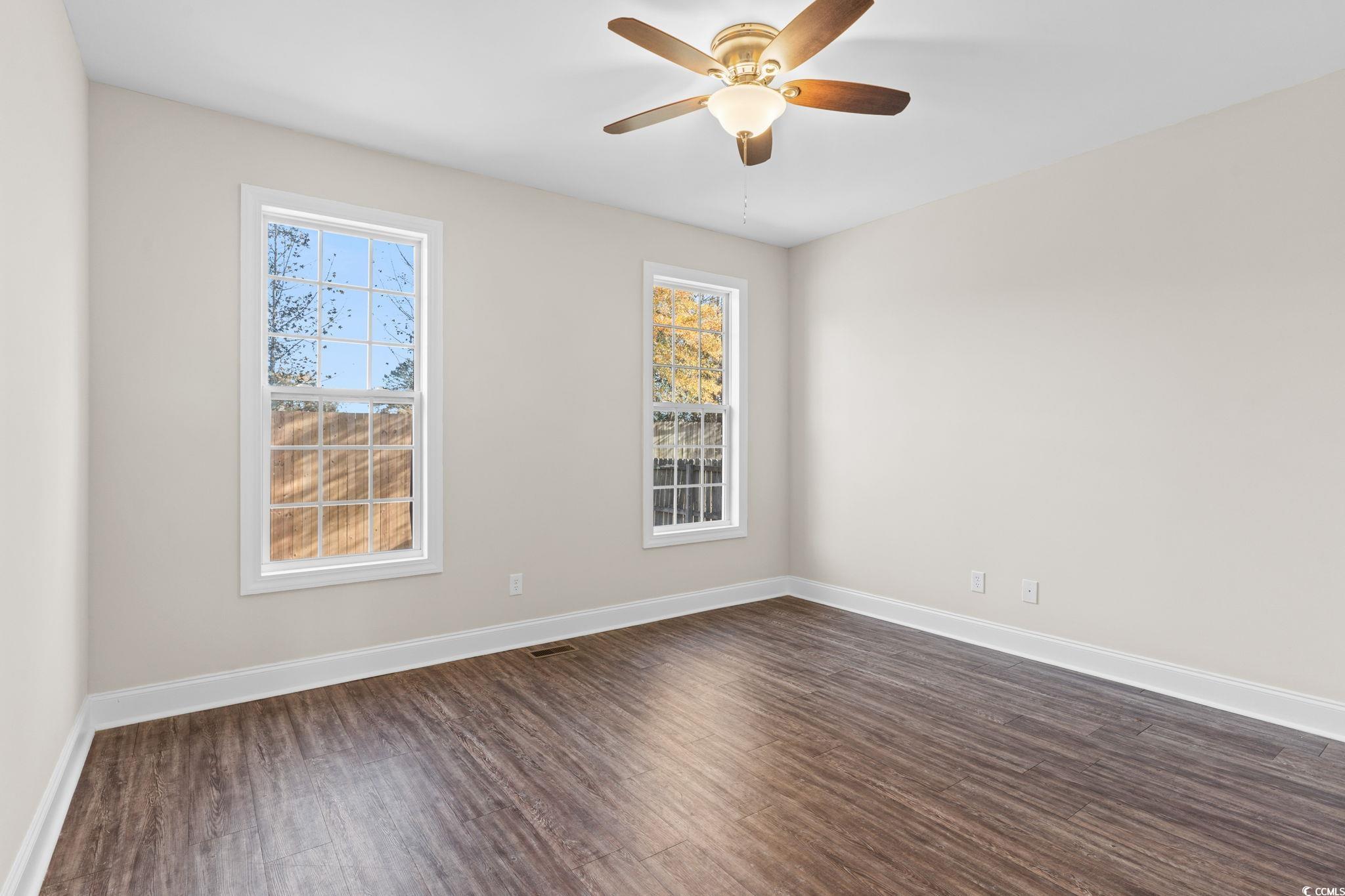 446 Sterling Drive Florence, SC 29501 - Photo 32 of 40 Spare room with dark hardwood / wood-style floors