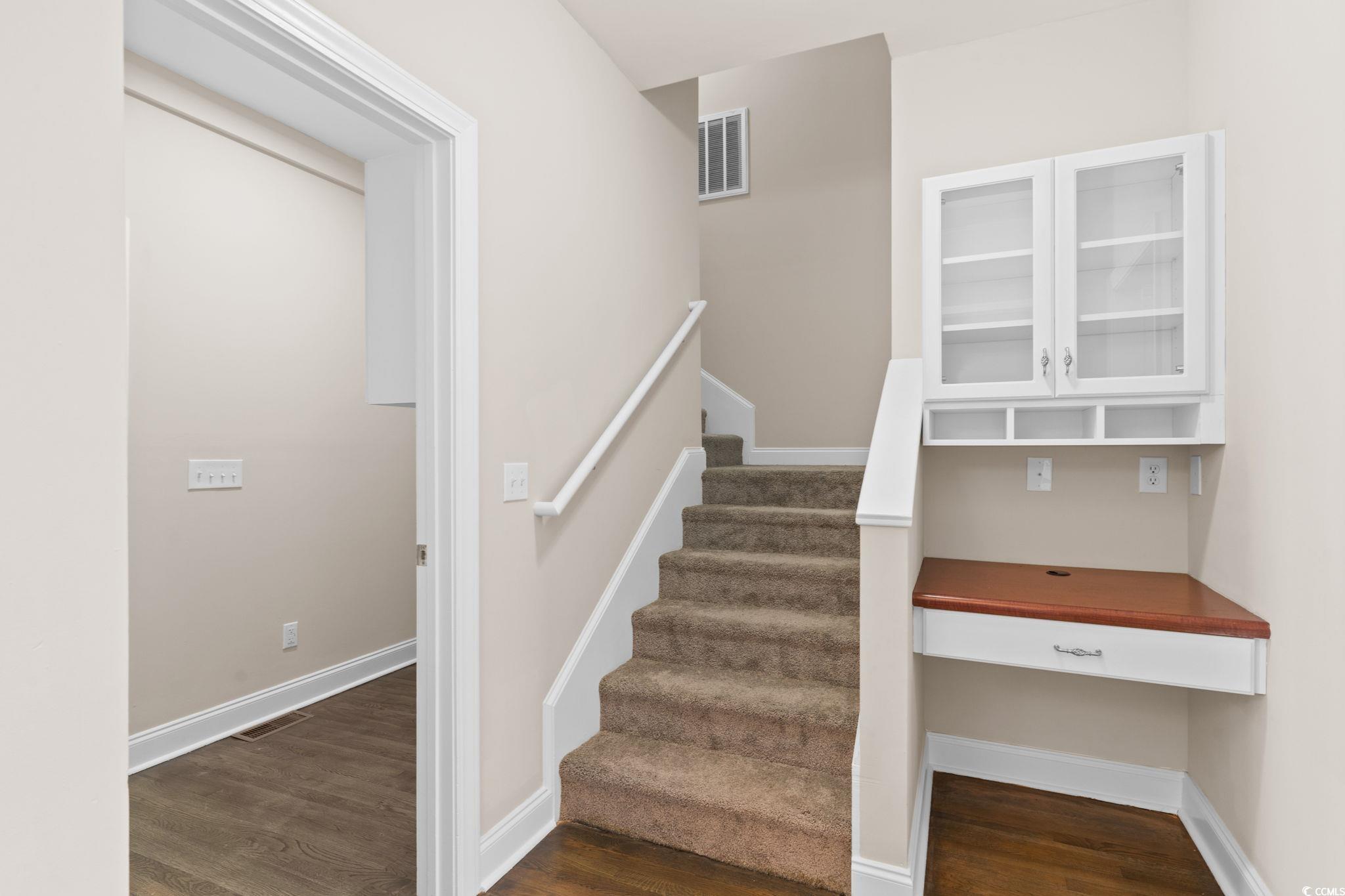 446 Sterling Drive Florence, SC 29501 - Photo 34 of 40 Stairway with wood-type flooring