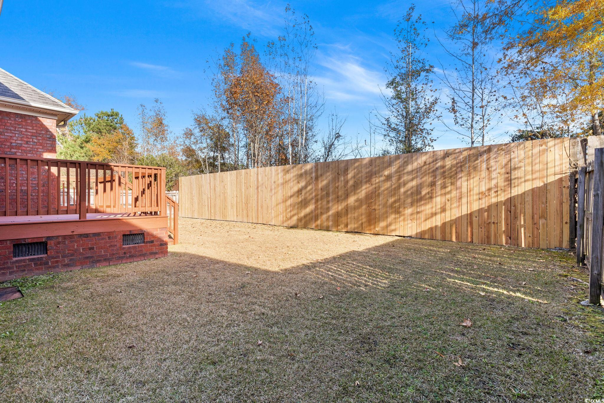 446 Sterling Drive Florence, SC 29501 - Photo 35 of 40 View of yard with a deck