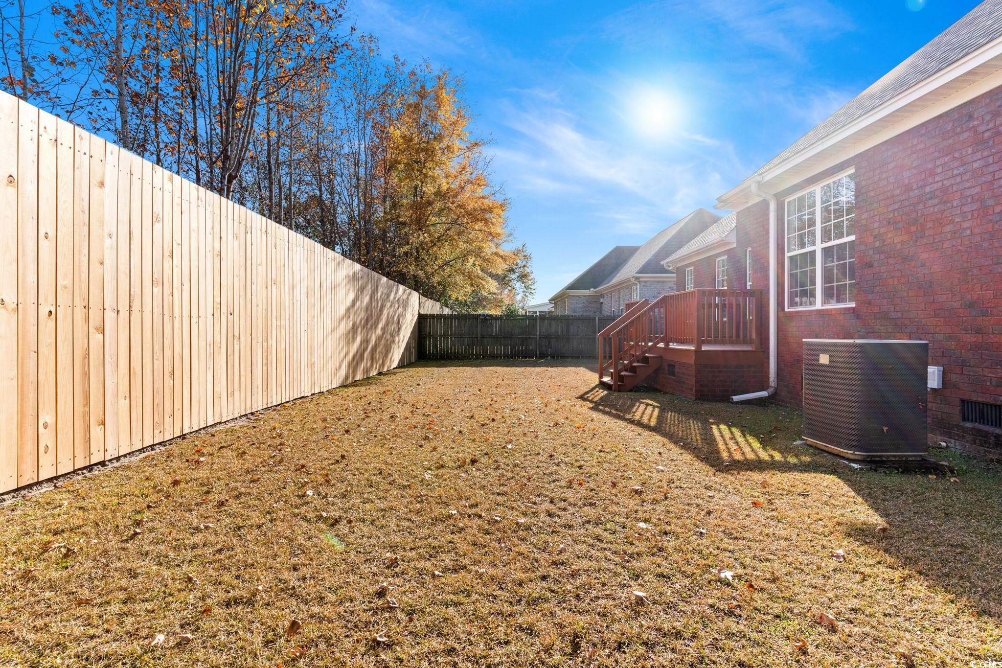 446 Sterling Drive Florence, SC 29501 - Photo 37 of 40 View of yard with central AC