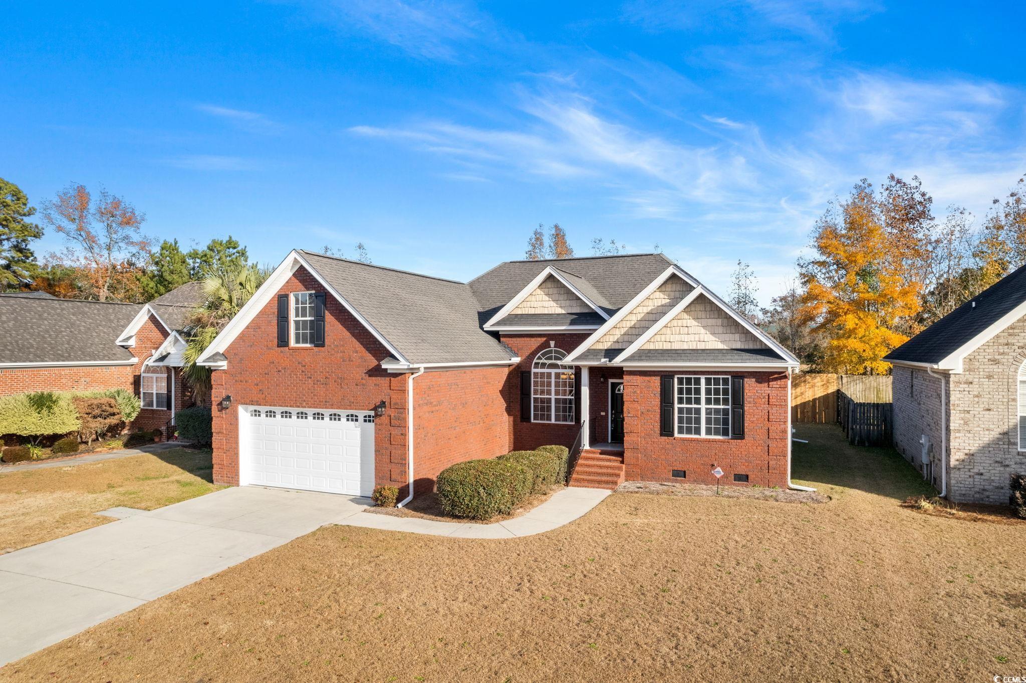 446 Sterling Drive Florence, SC 29501 - Photo 5 of 40 View of front of home with a garage and a front la