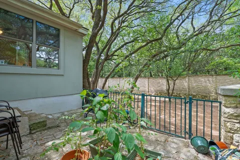 a backyard of a house with lots of green space