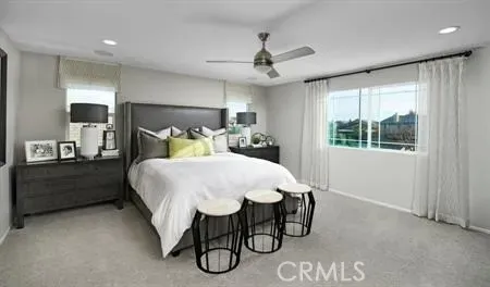 a bed room with a bed and a window