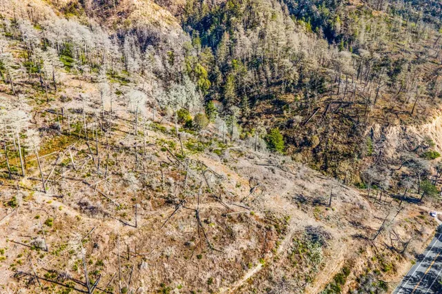 a view of mountain view with mountains in the background