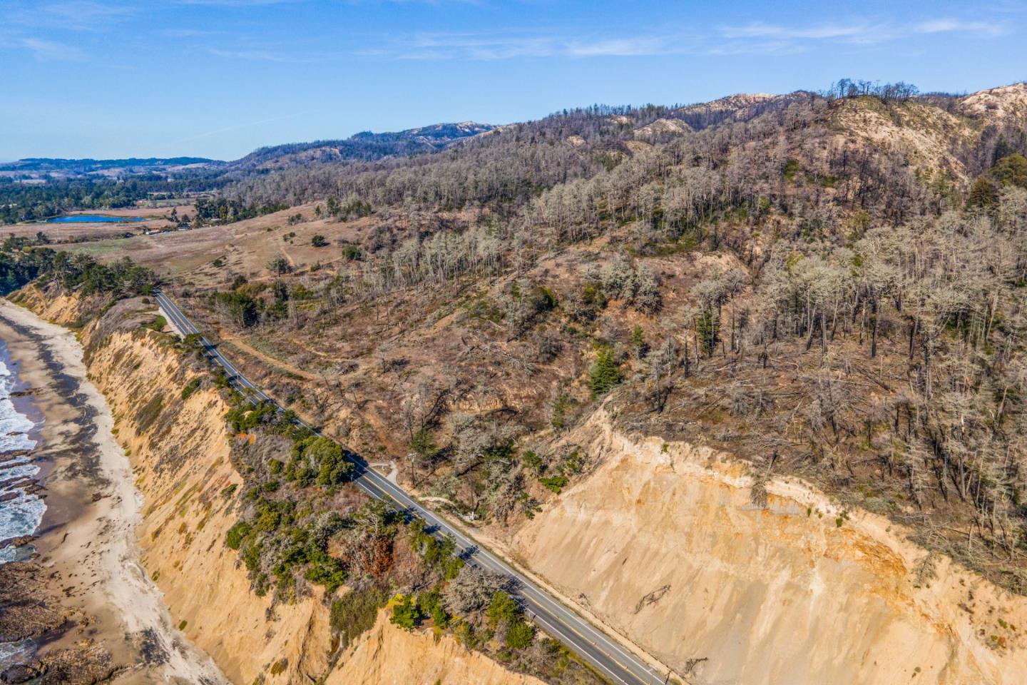 3744 Highway 1 Pescadero, CA 94060 - Photo 15 of 32 a view of mountain with sunset