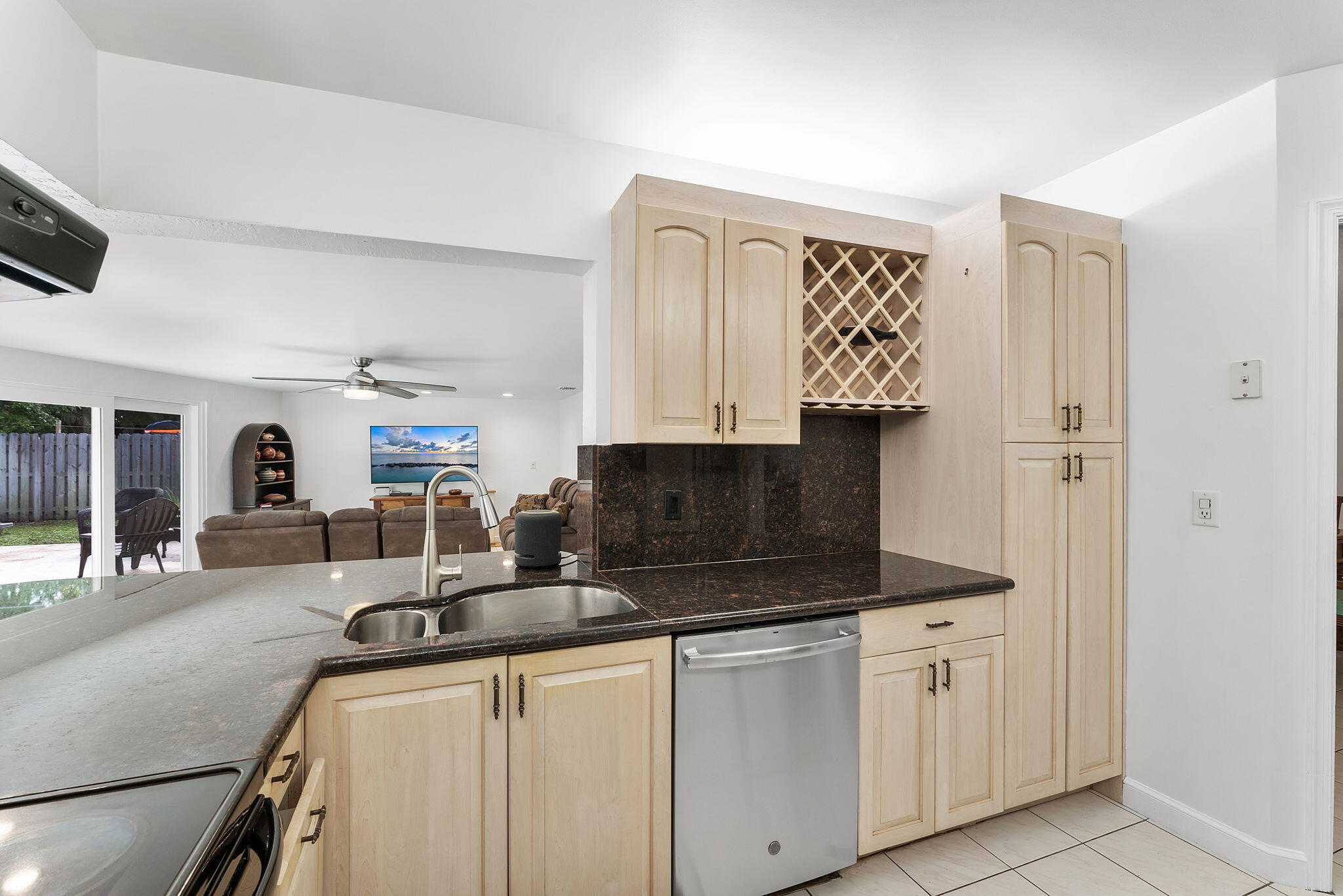 788 Northwest 7th Drive Boca Raton, FL 33486 - Photo 12 of 46 a kitchen with stainless steel appliances granite countertop a sink and a granite counter tops