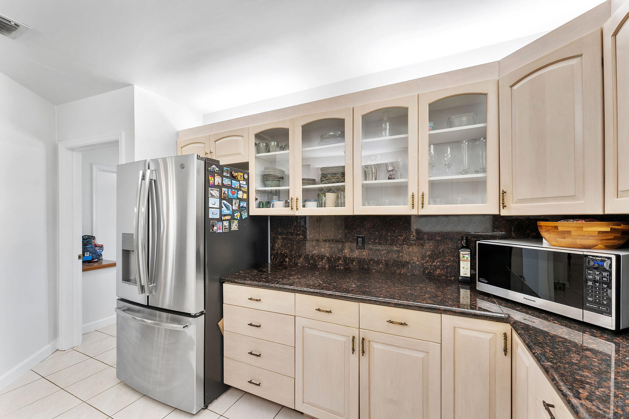 788 Northwest 7th Drive Boca Raton, FL 33486 - Photo 13 of 46 a kitchen with stainless steel appliances granite countertop a refrigerator and a stove