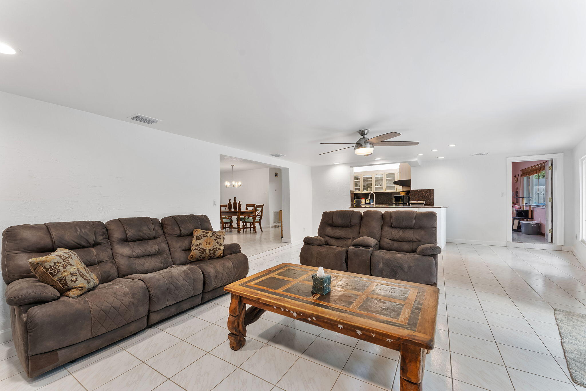 788 Northwest 7th Drive Boca Raton, FL 33486 - Photo 15 of 46 a living room with furniture and a couch