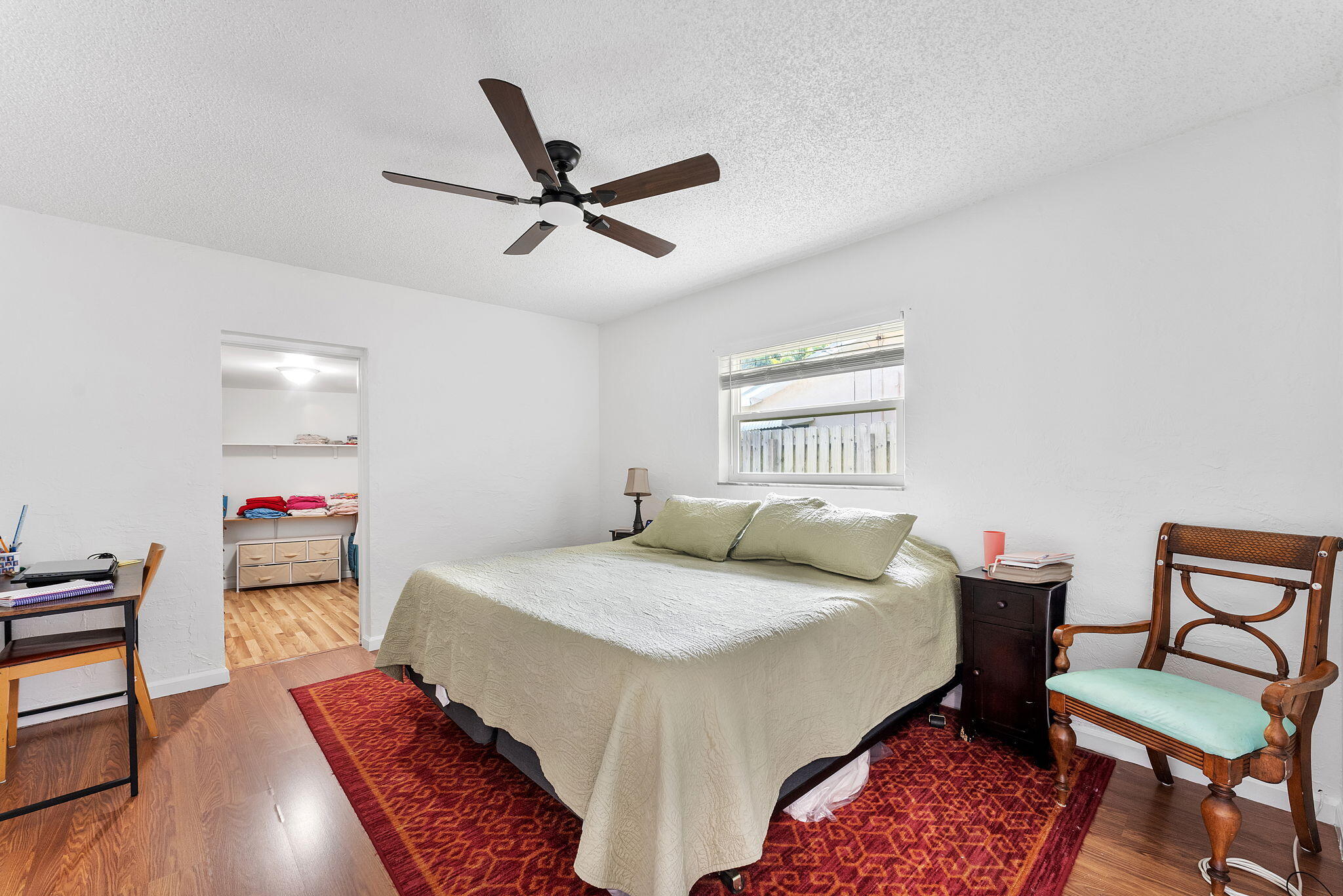788 Northwest 7th Drive Boca Raton, FL 33486 - Photo 20 of 46 a bedroom with a bed and furniture