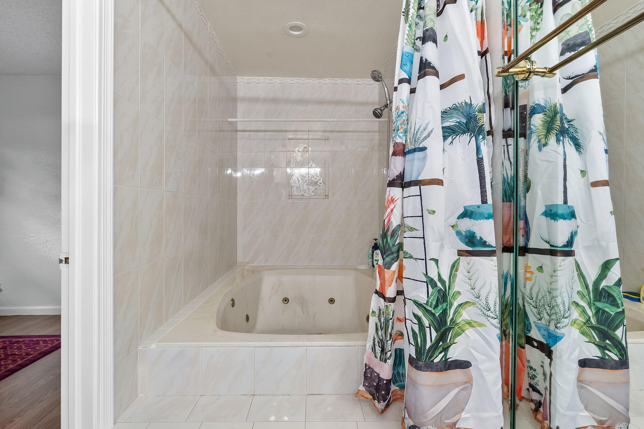 788 Northwest 7th Drive Boca Raton, FL 33486 - Photo 24 of 46 a white bath tub sitting in a bathroom next to a tub
