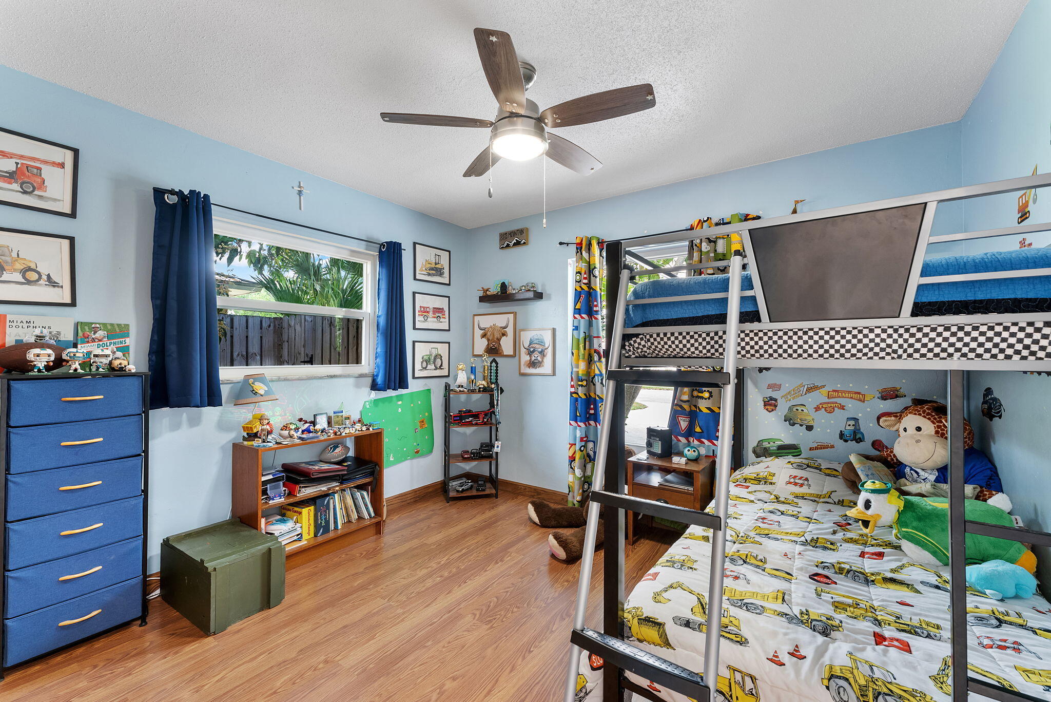 788 Northwest 7th Drive Boca Raton, FL 33486 - Photo 26 of 46 a bed room with furniture and a window