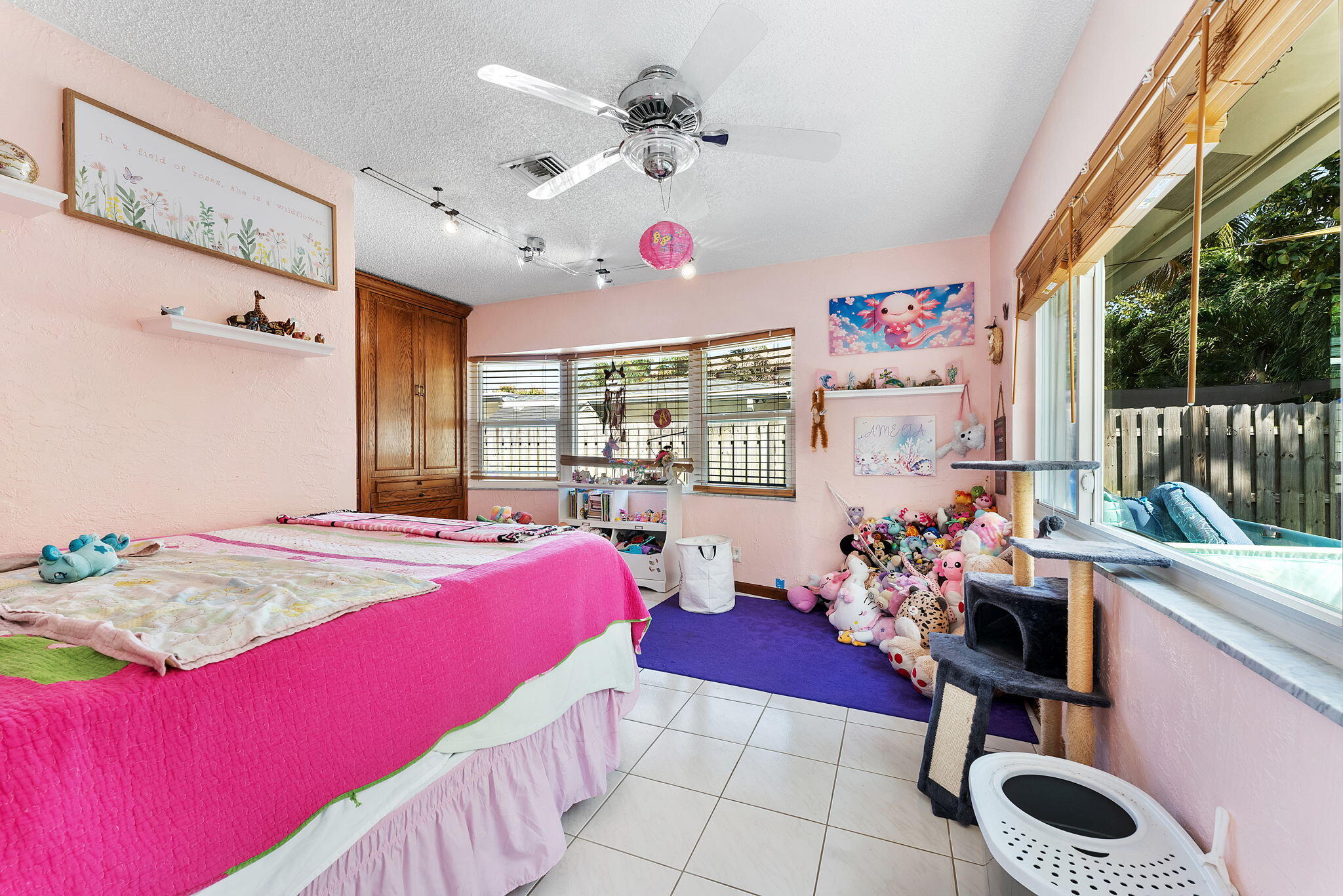 788 Northwest 7th Drive Boca Raton, FL 33486 - Photo 27 of 46 a bedroom with furniture and a bed