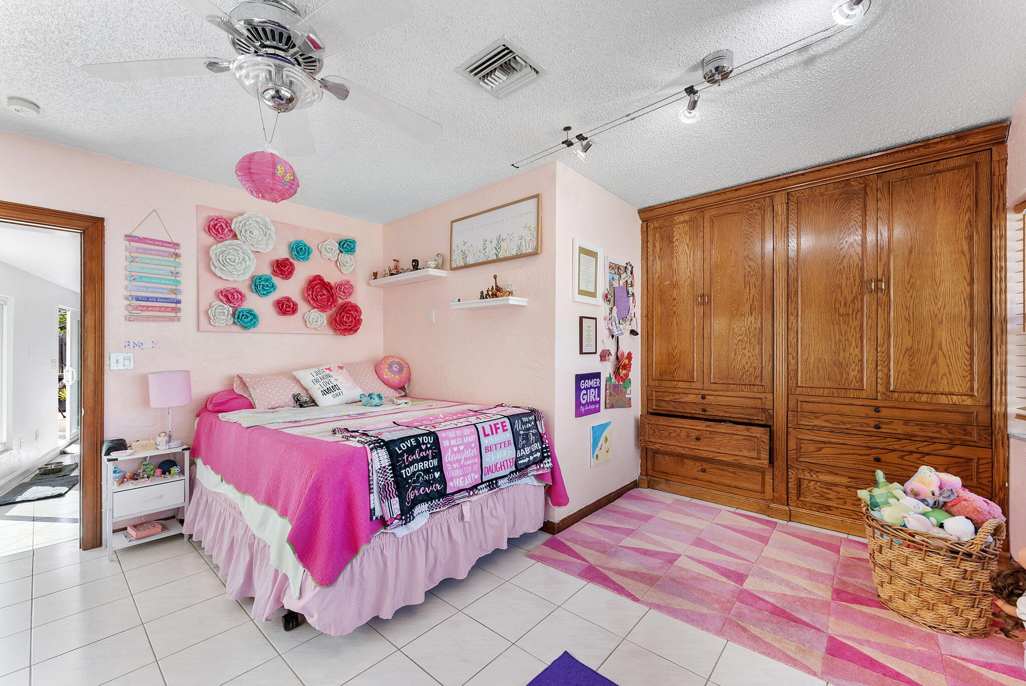 788 Northwest 7th Drive Boca Raton, FL 33486 - Photo 28 of 46 a bedroom with a bed and a window