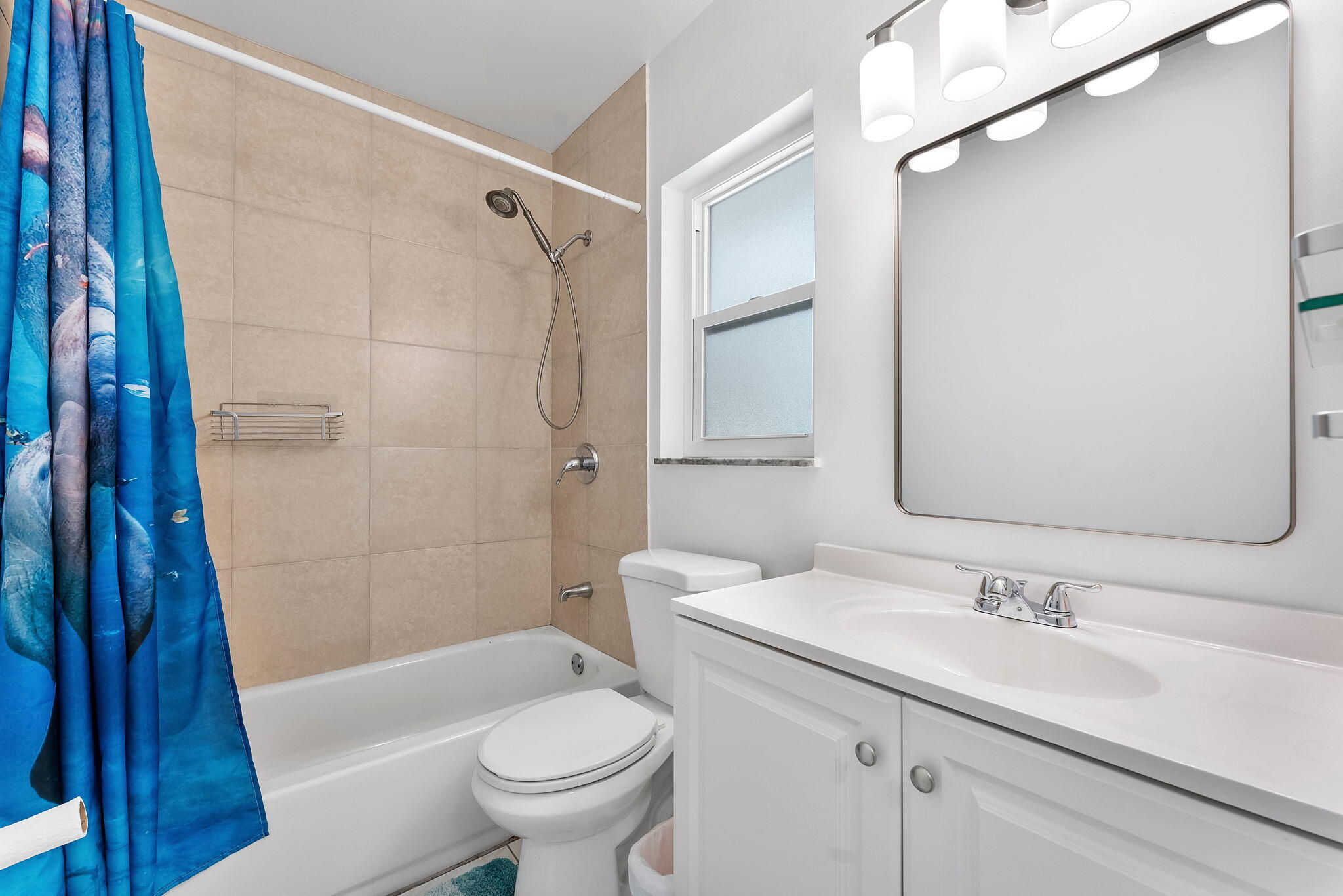 788 Northwest 7th Drive Boca Raton, FL 33486 - Photo 32 of 46 a bathroom with a sink a toilet and shower