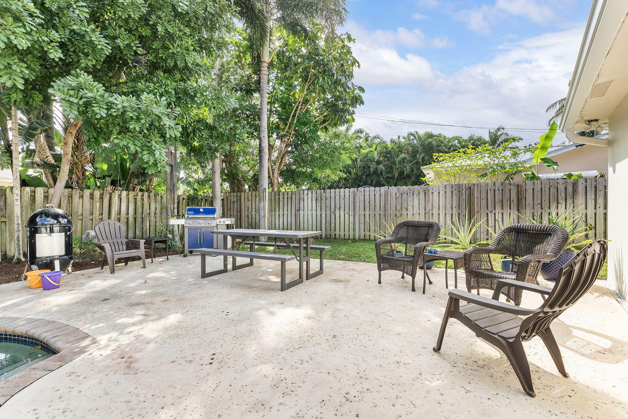 788 Northwest 7th Drive Boca Raton, FL 33486 - Photo 36 of 46 a view of chair and tables in the patio
