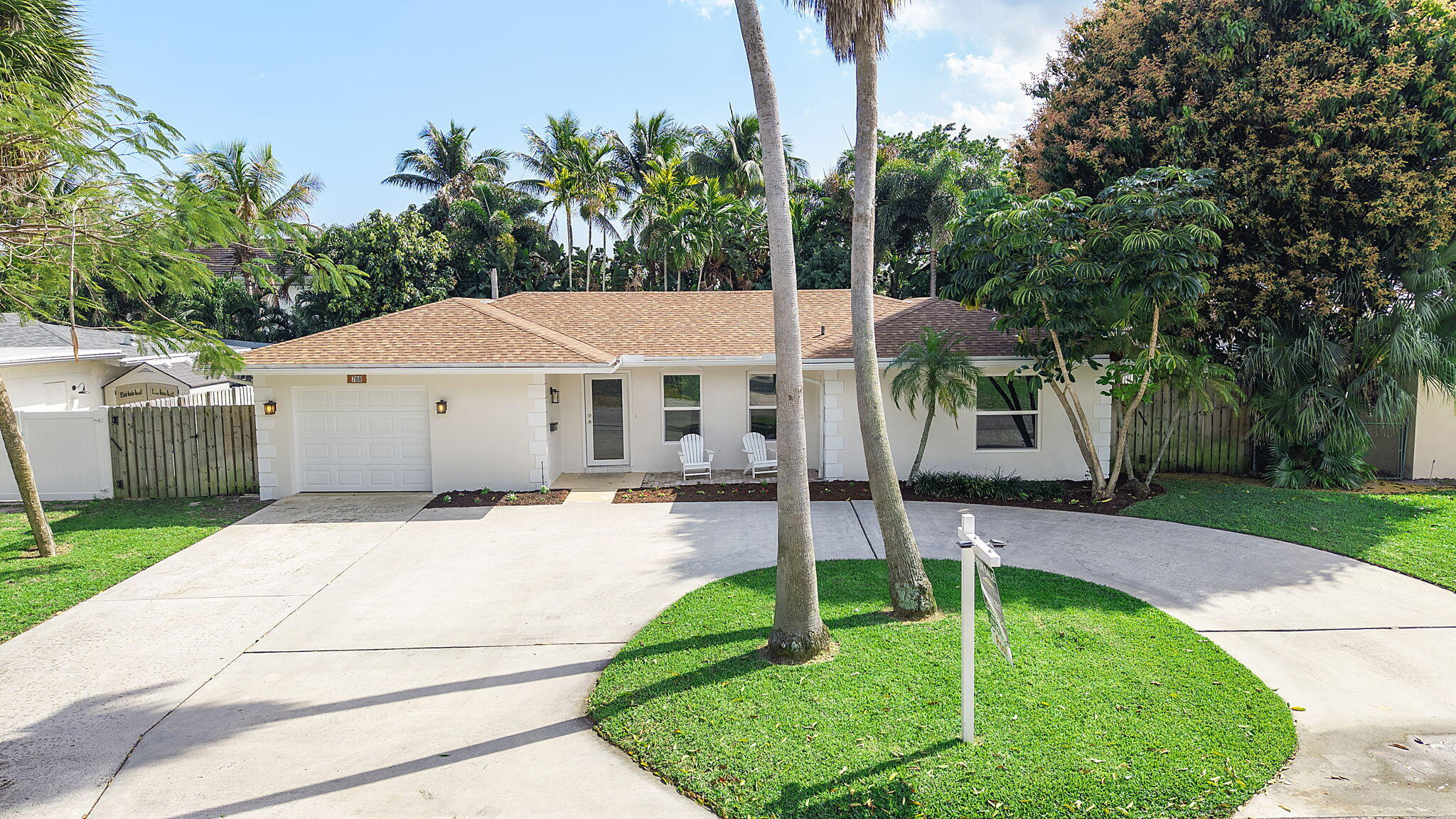 788 Northwest 7th Drive Boca Raton, FL 33486 - Photo 4 of 46 a house with garden in front of it