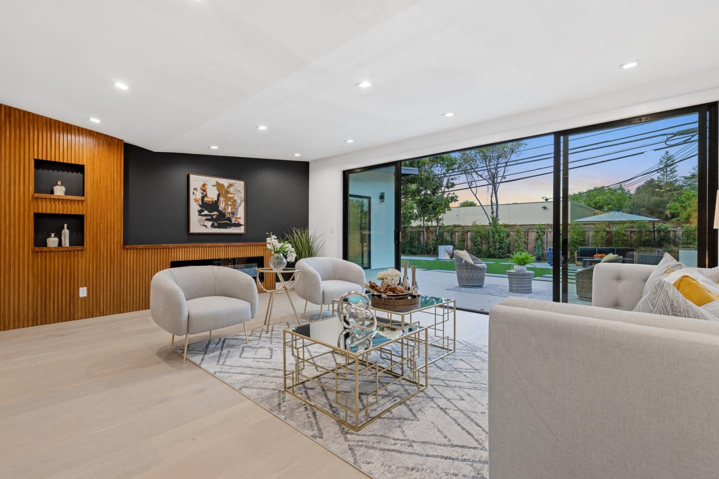 3633 Louis Road Palo Alto, CA 94303 - Photo 12 of 42 a living room with furniture and a large window
