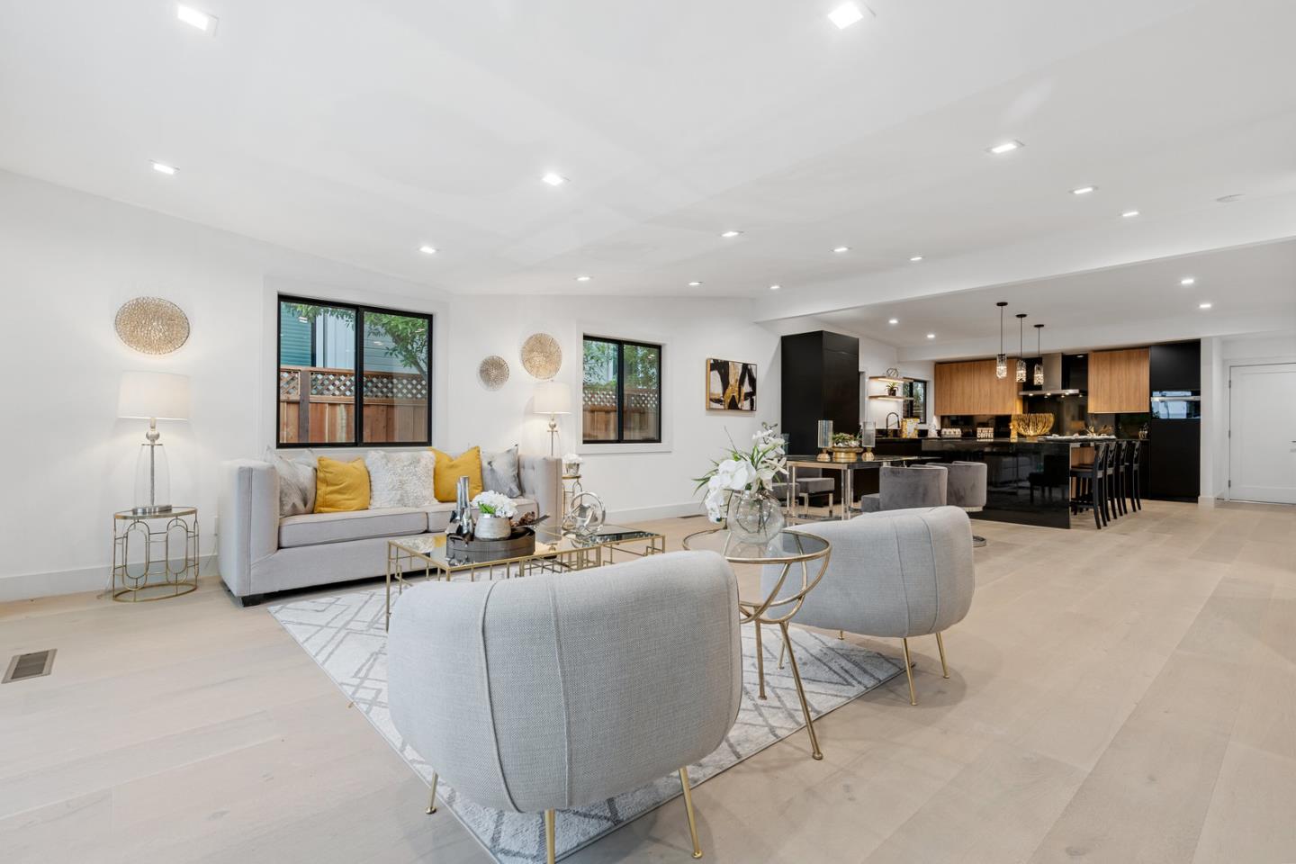 3633 Louis Road Palo Alto, CA 94303 - Photo 14 of 42 a living room with furniture kitchen view and a window